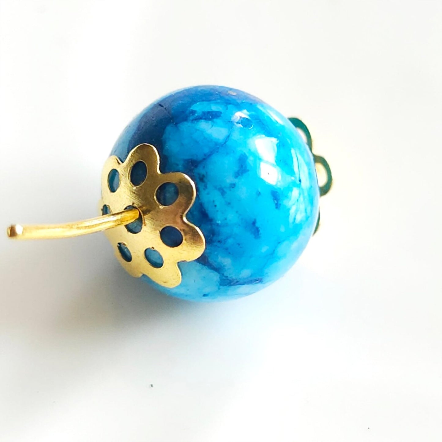 Bring neat handmade detail to jhumka making and latkan work through ornate gold latkan finishing caps.