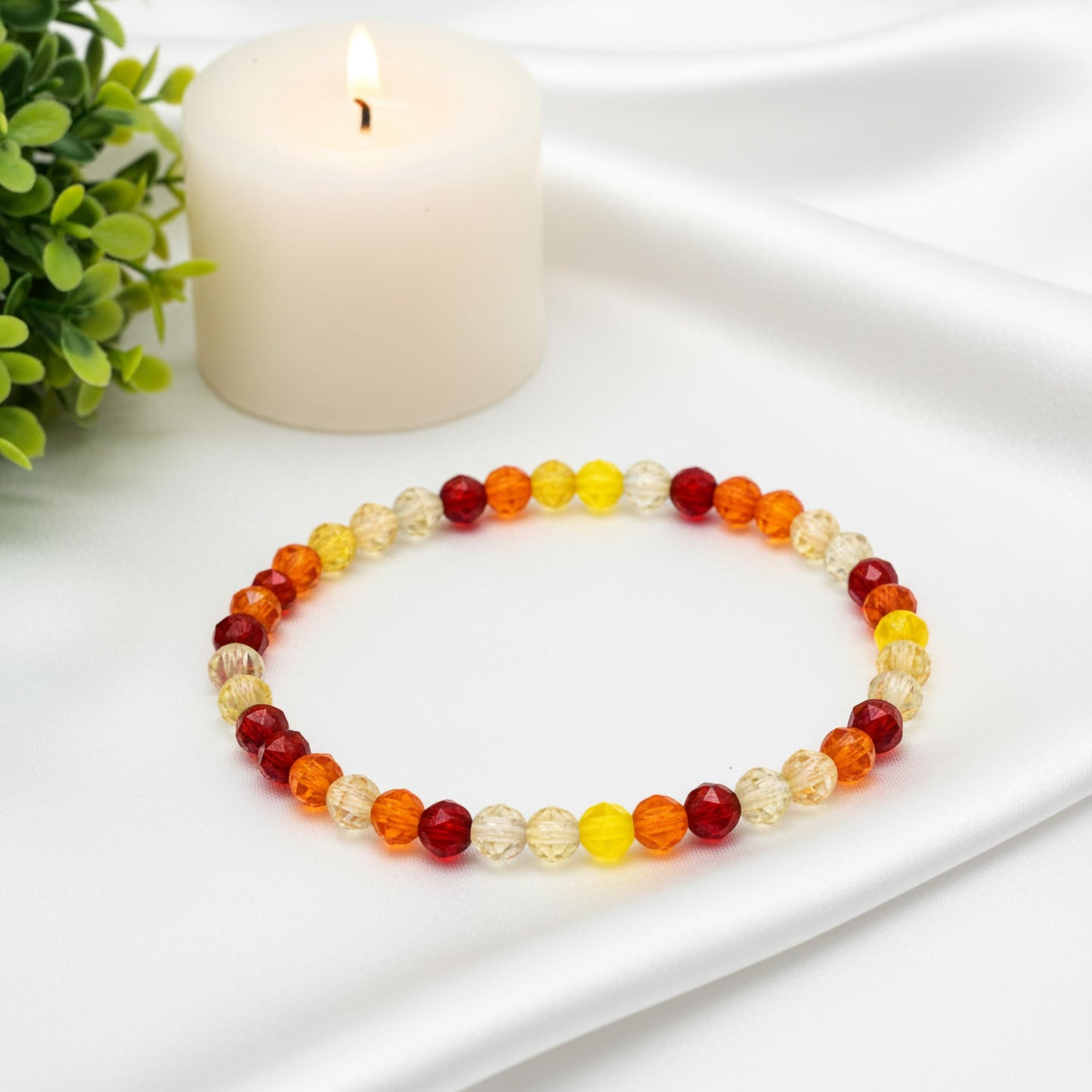 Bring a polished bead finish to casual outfits with a orange faceted bracelet set.