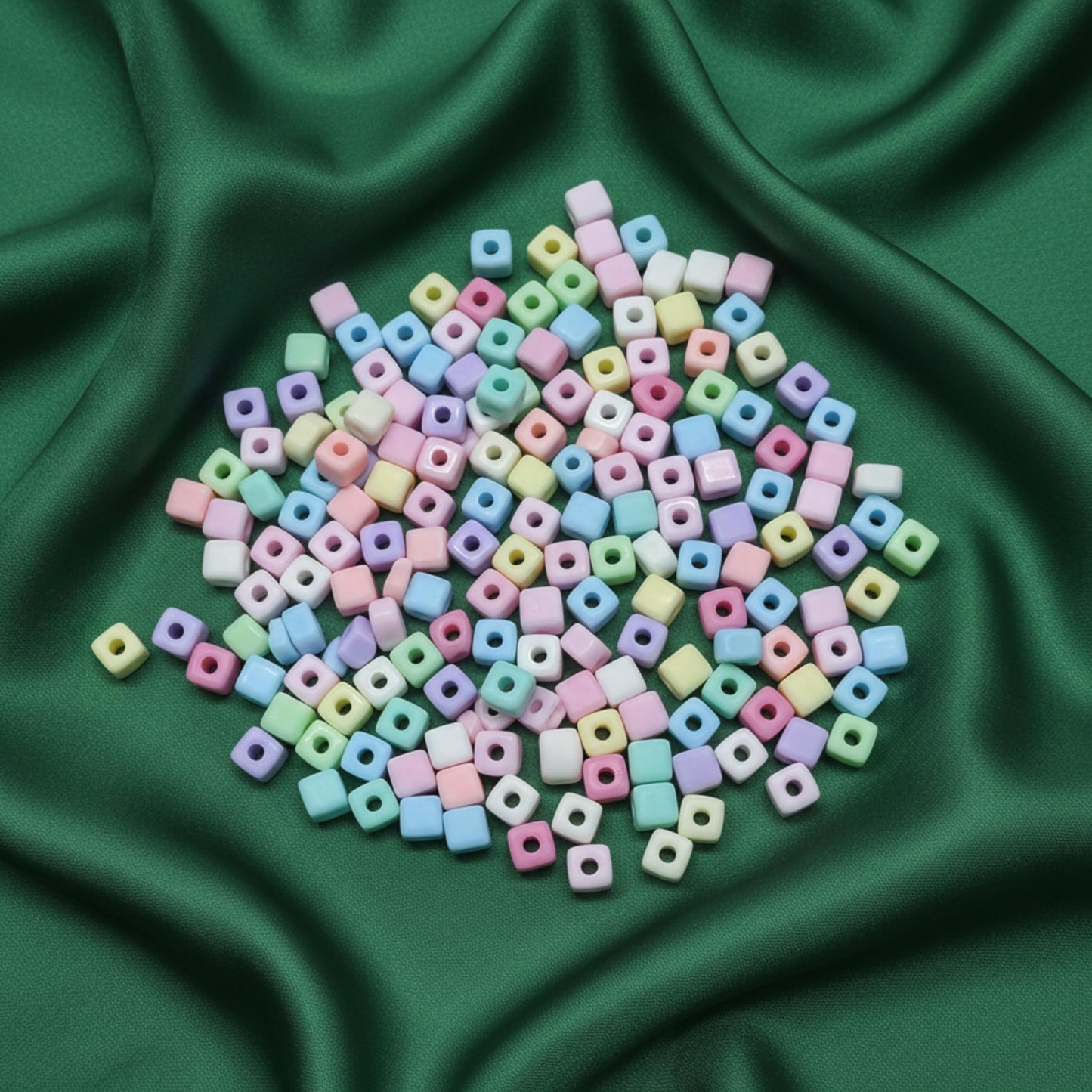 Make craft projects feel bright and organized with pastel square beads for jewelry and accessories.