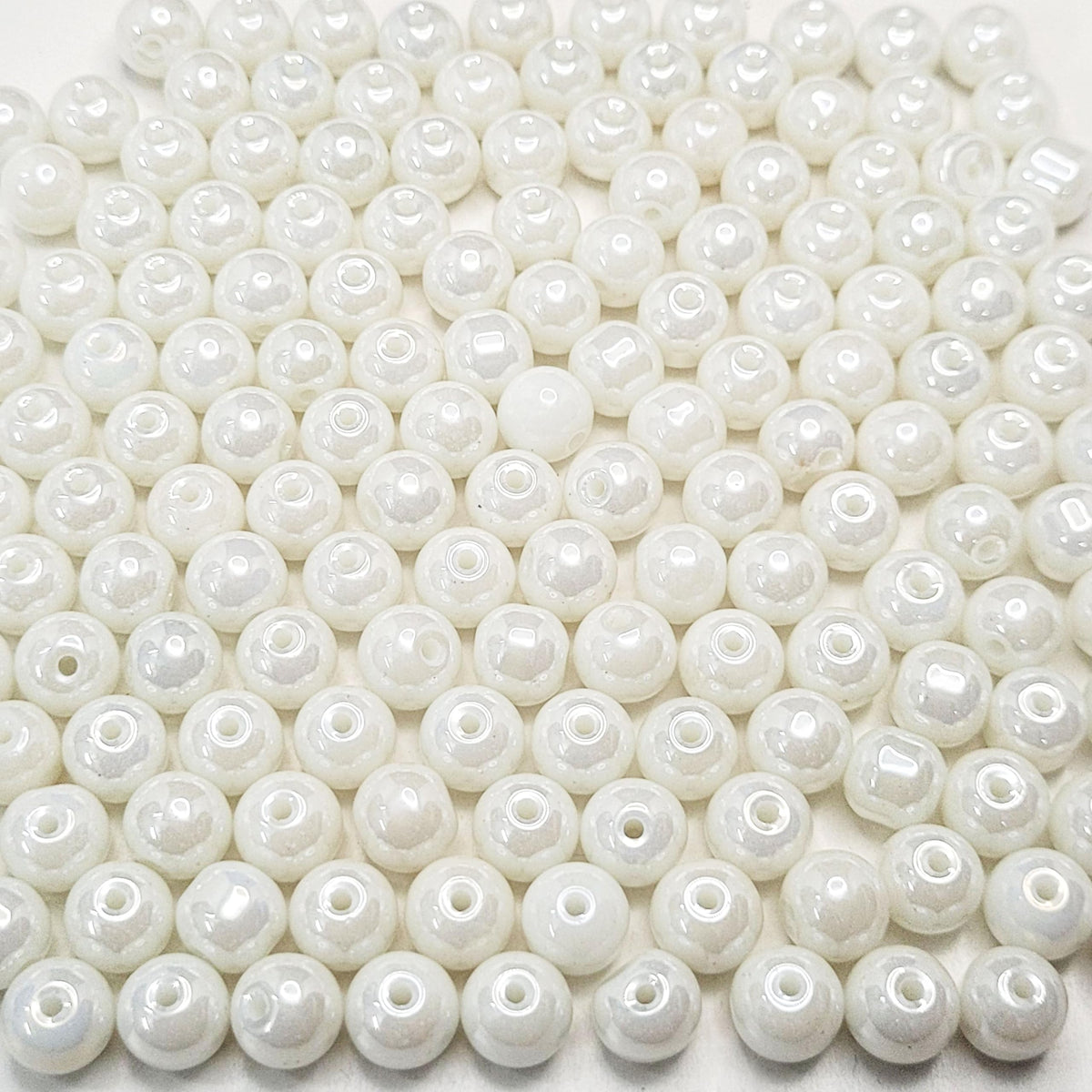 Use white and multicolour 8mm beads to give bracelet making, necklace making and DIY jewellery projects a clean decorative look with white detail.