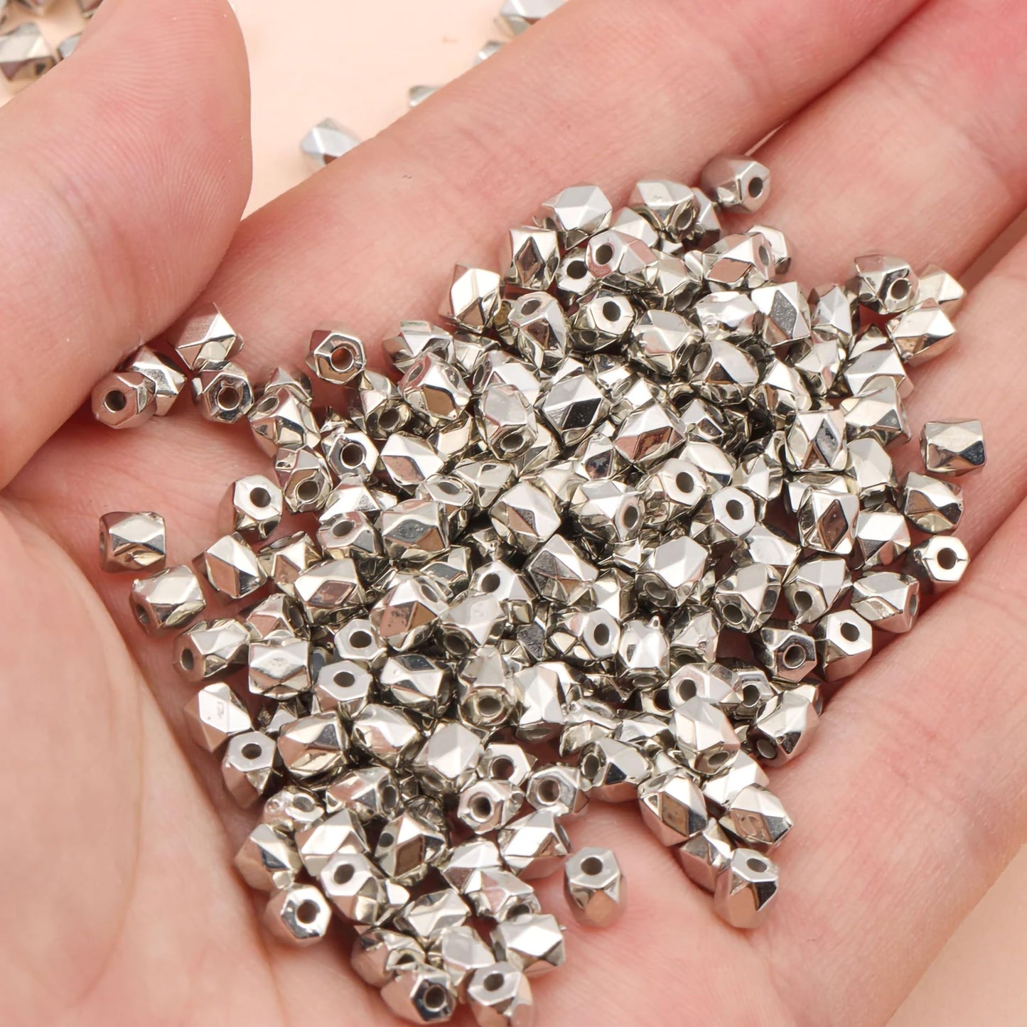 For a cleaner finish in necklace making and DIY jewellery projects, drum silver and gold plastic and acrylic beads are a useful choice.