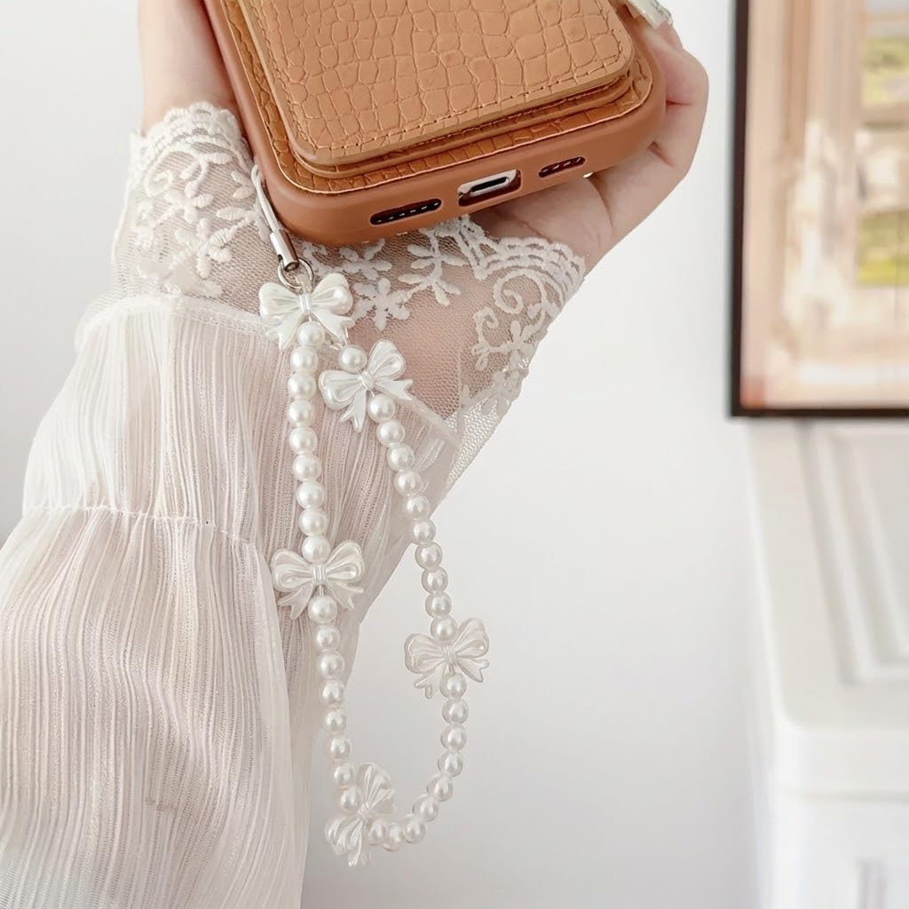White Cell Phone Mobile Strap with Crystal Beads and Pearls. Detailed product image showing size, surface, and material quality.
