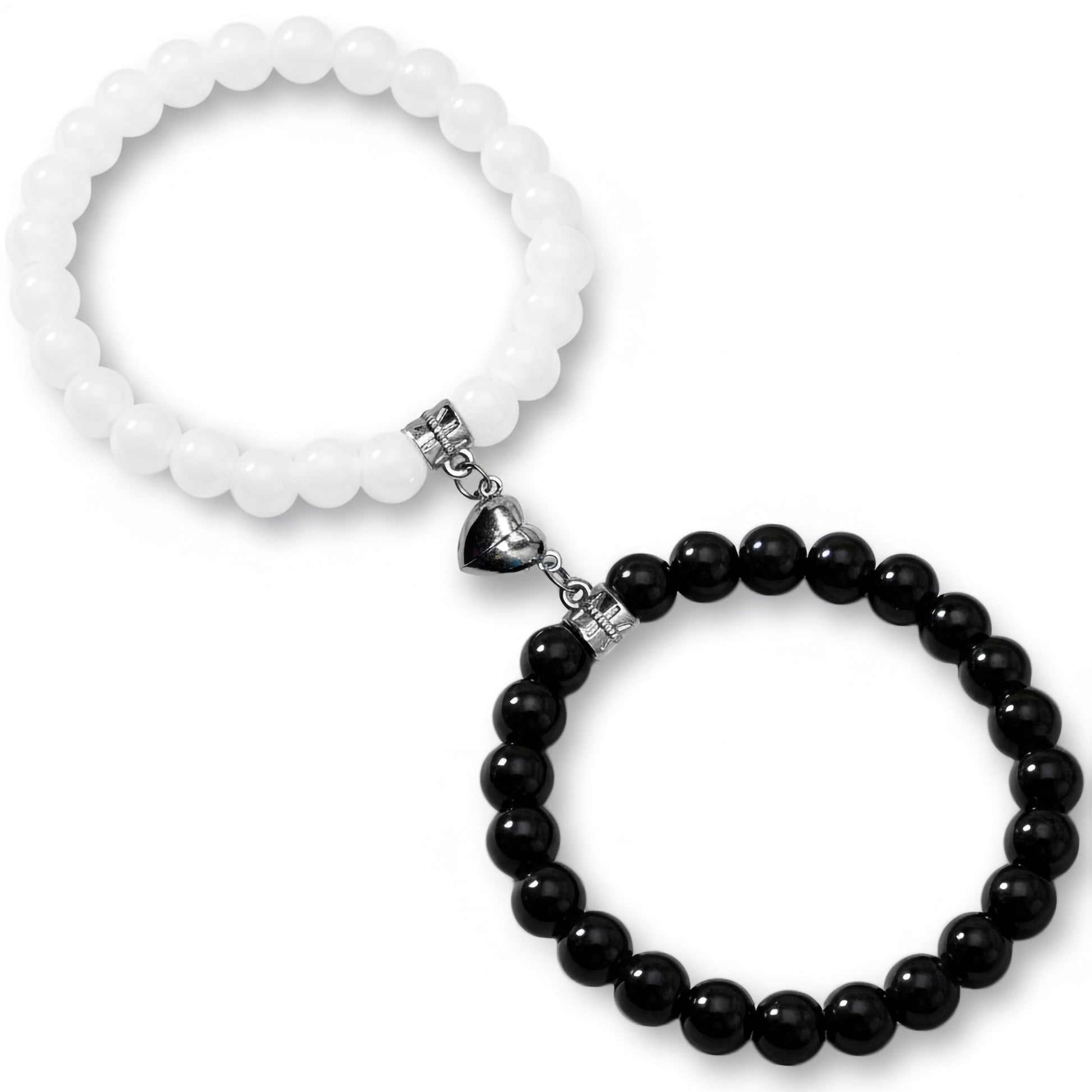 Celebrate couple style with white and black 1-pair magnetic heart bracelets for partners and best friends.