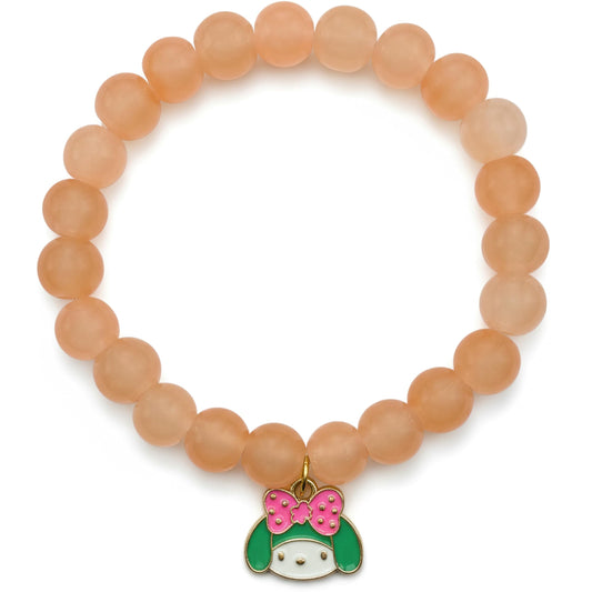Add a sweet handmade touch to wrist styling with a peach beaded elastic bracelet.