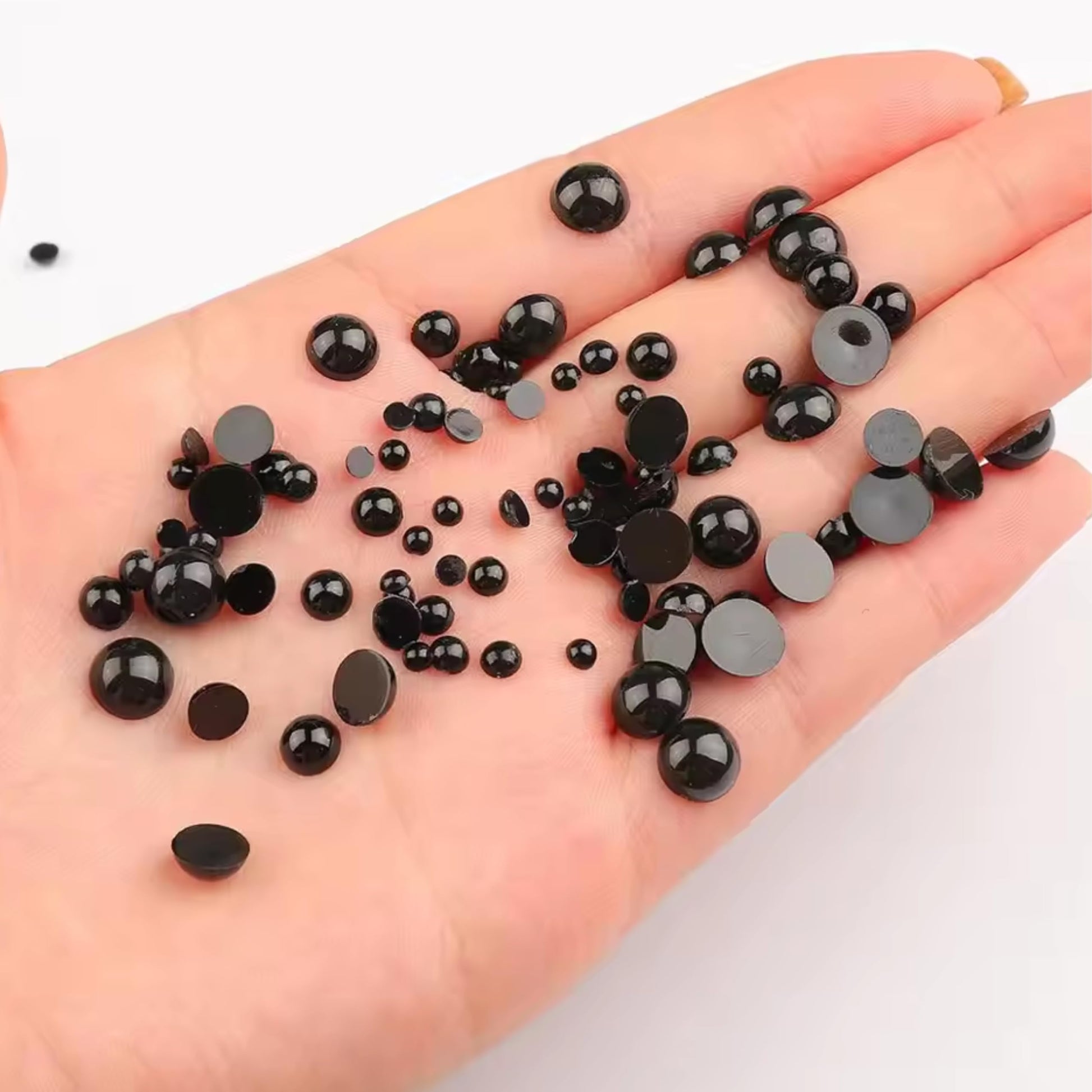 Freshen up resin craft and phone case art with black half pearl accents.