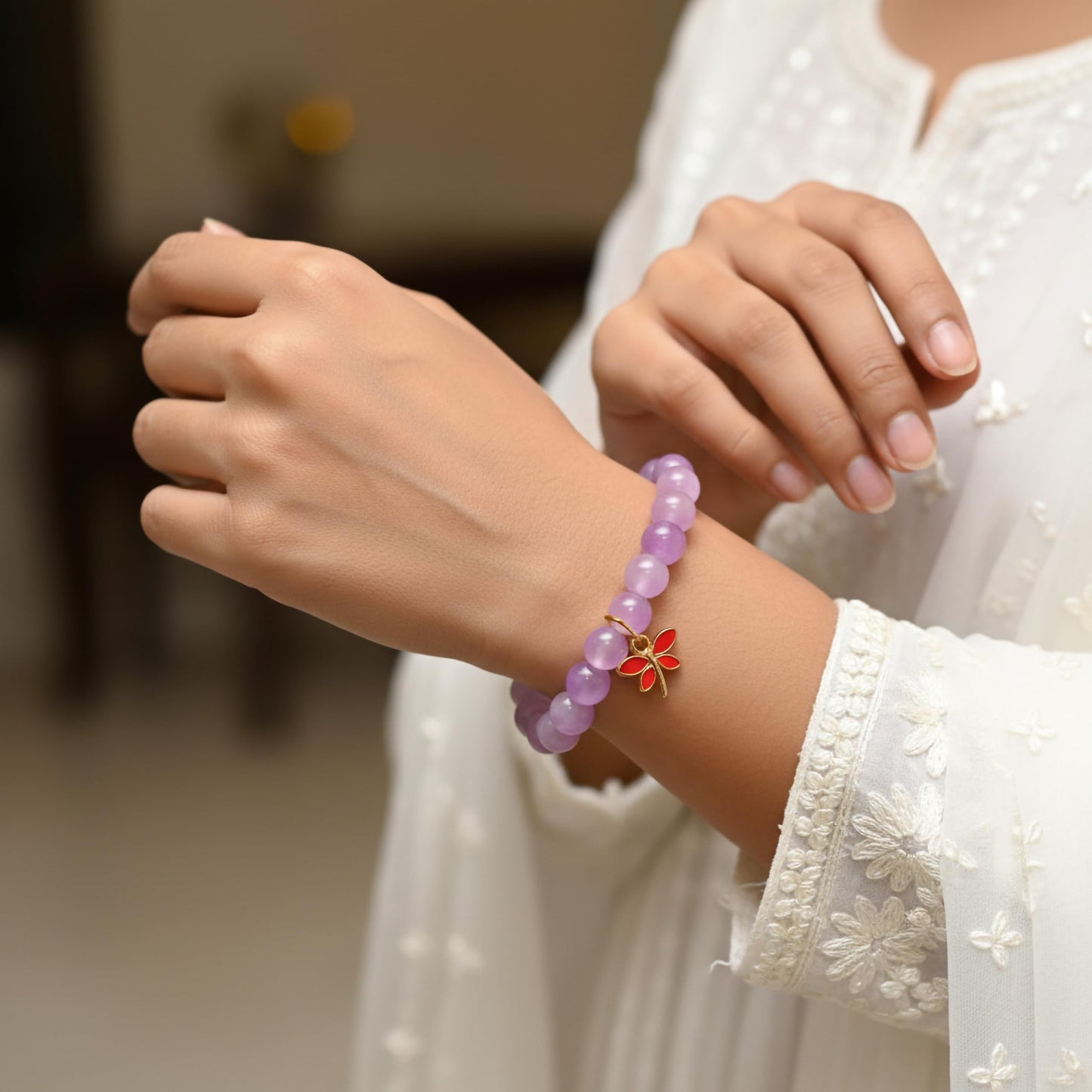 Create a playful accessory look using lavender dualtone beads and cute bracelet charms.