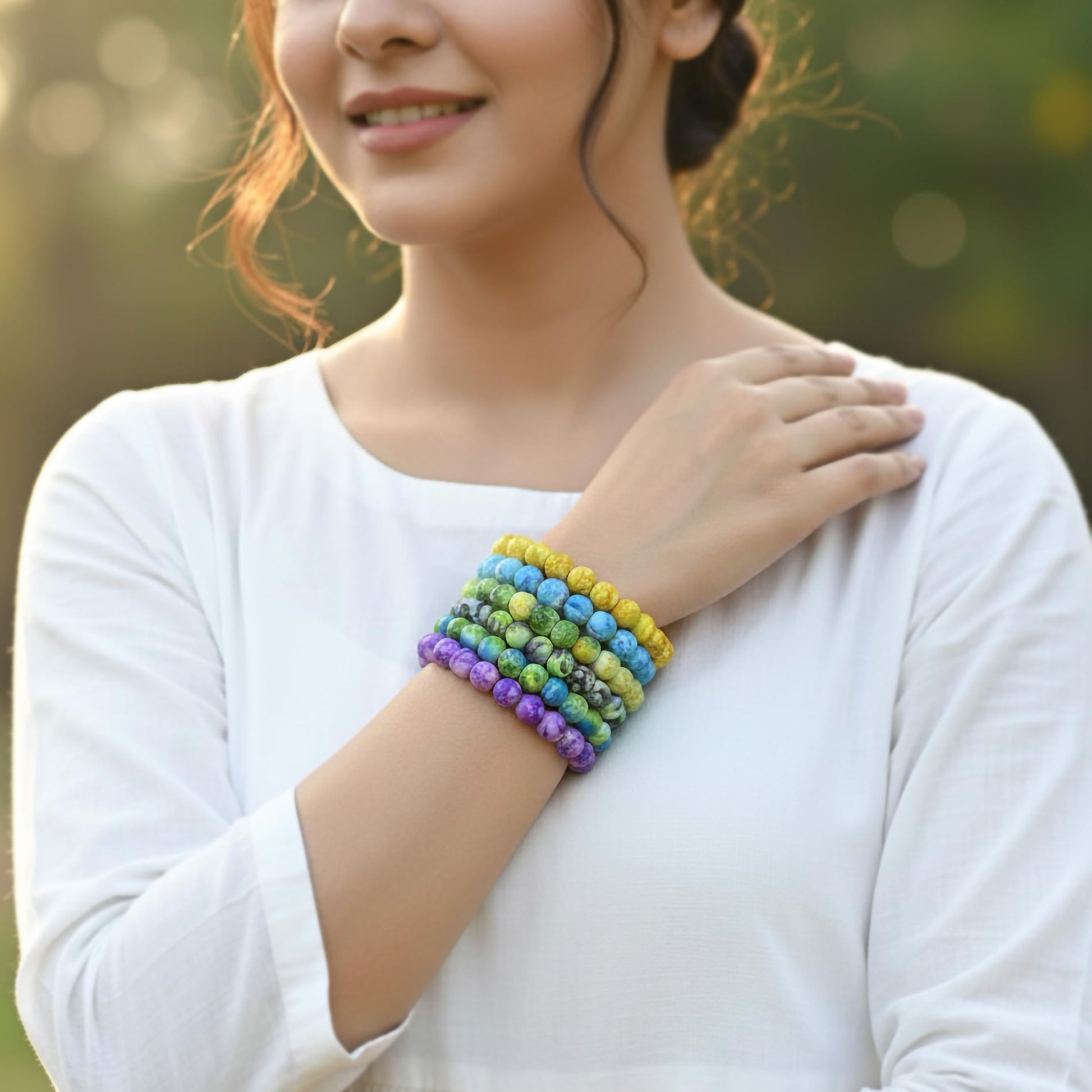 Style everyday outfits with a multicolor bead bracelet that feels cute, light and easy to layer.