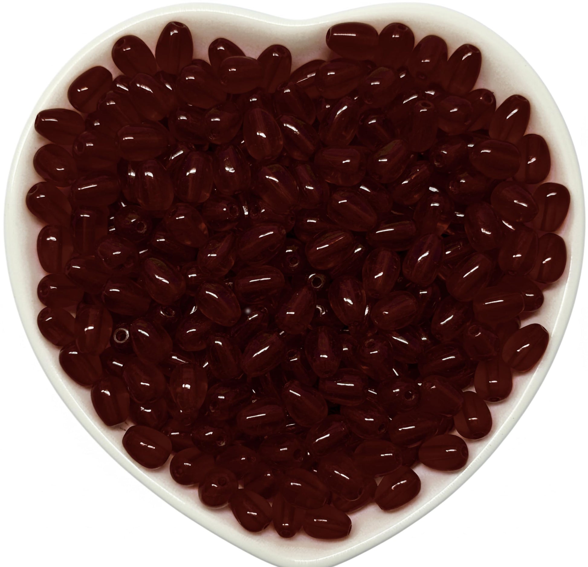 Use these 8x5mm maroon glossy assorted drop beads to make saree kuchu work feel more finished.