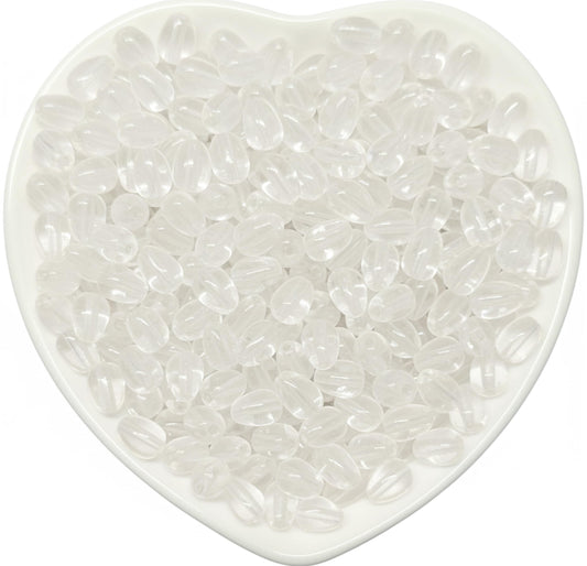 These 8x5mm white glossy teardrop bead accents bring clean bead detail to bracelet making and saree kuchu work.