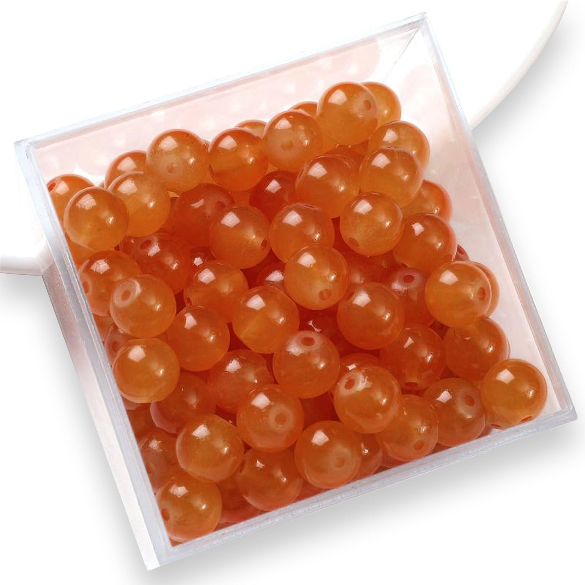 Orange and pearl 8mm charms help shape a polished result for bracelets, keychains and DIY jewellery projects.