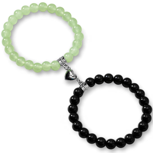 Celebrate friendship styling with black and green 1-pair magnetic heart bracelets for BFF gifting.
