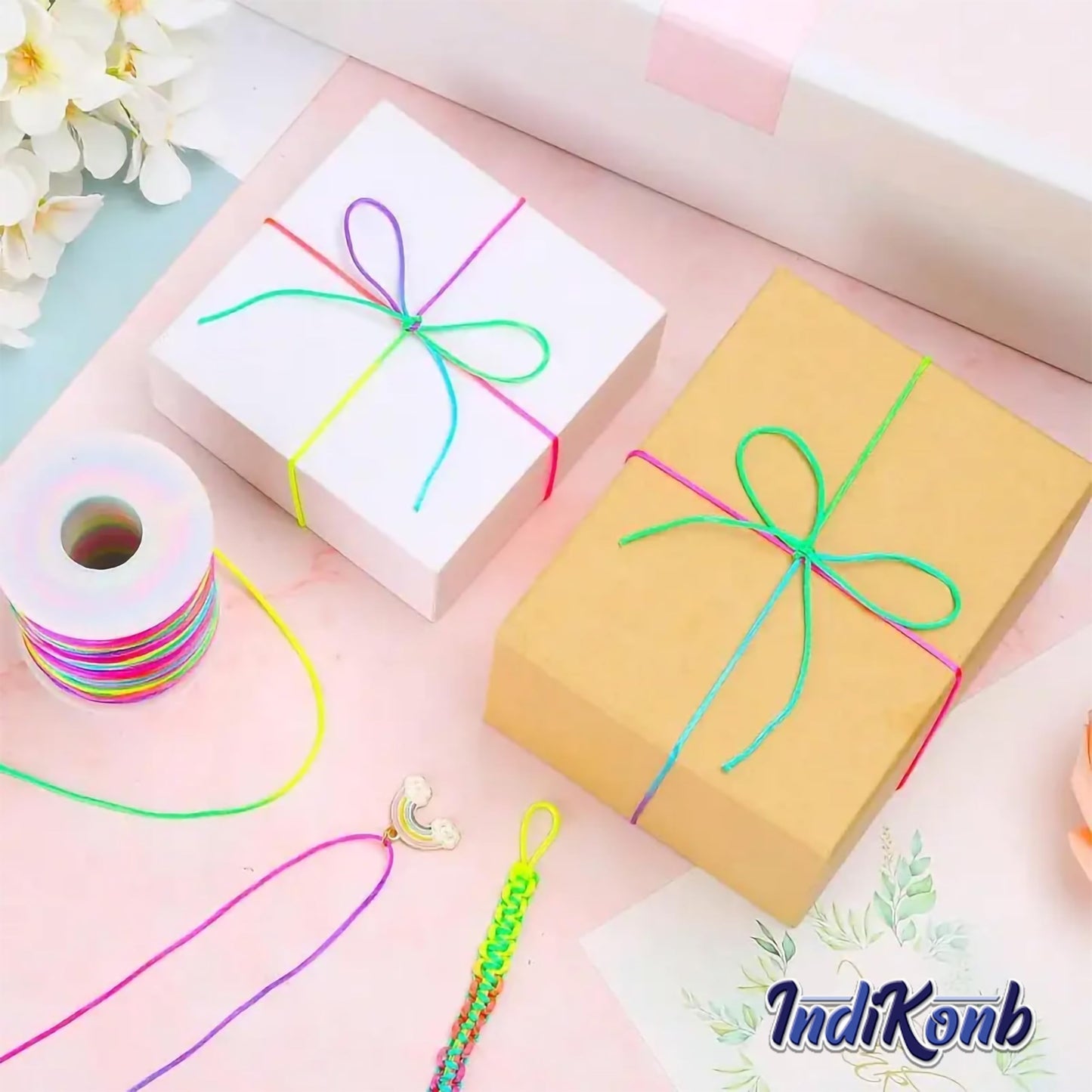 Multicolor Rainbow Elastic String Roll Nylon. Packaging and contents image showing the full item set.