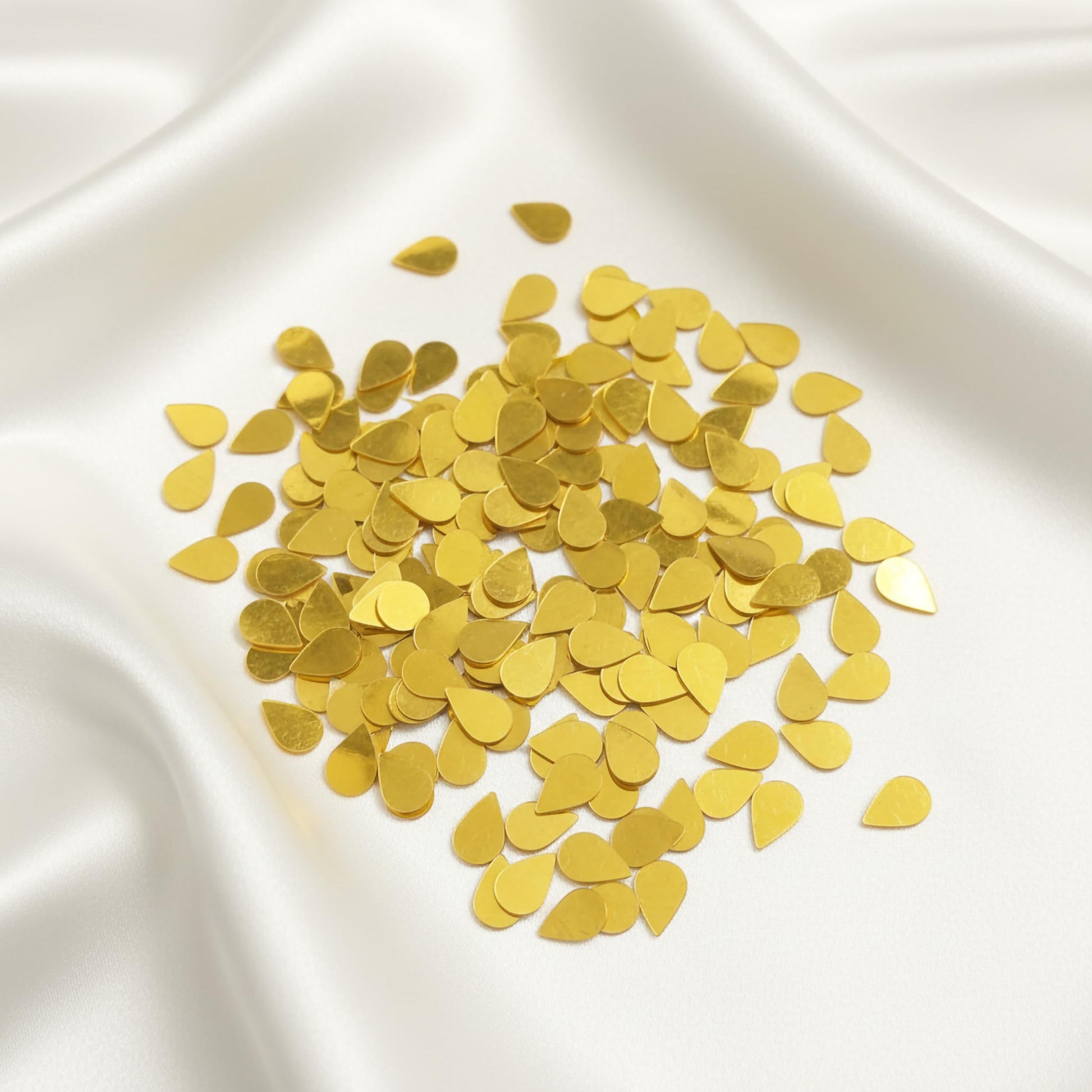 Freshen up dress decoration and boutique craft projects with metallic gold dress craft sequins.