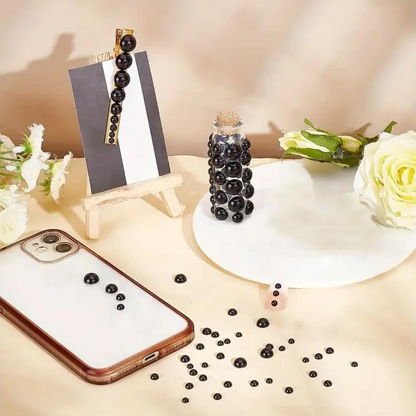 Bring neat handmade detail to jewelry decoration and resin craft through smooth black craft pearl pieces.