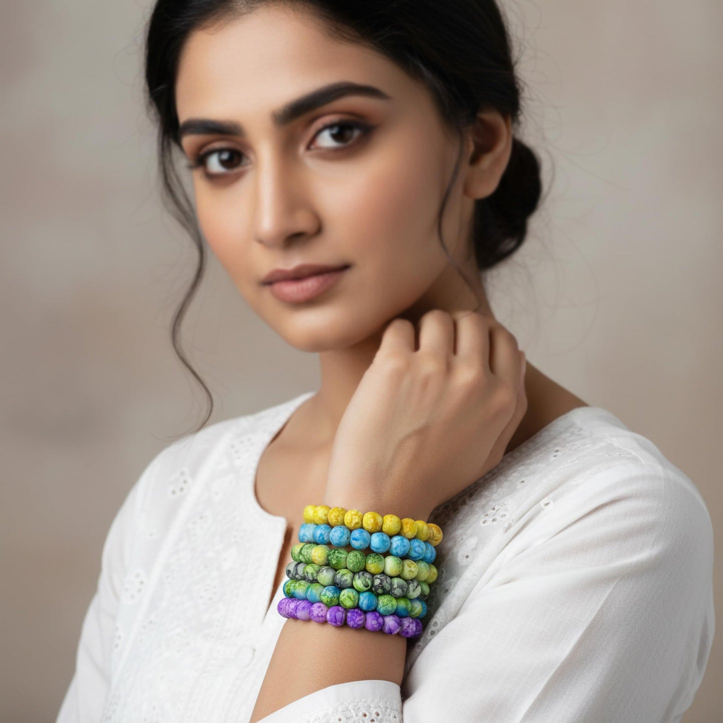 Create a fresh friendship-band look using multicolor marble beads and easy stretch styling.