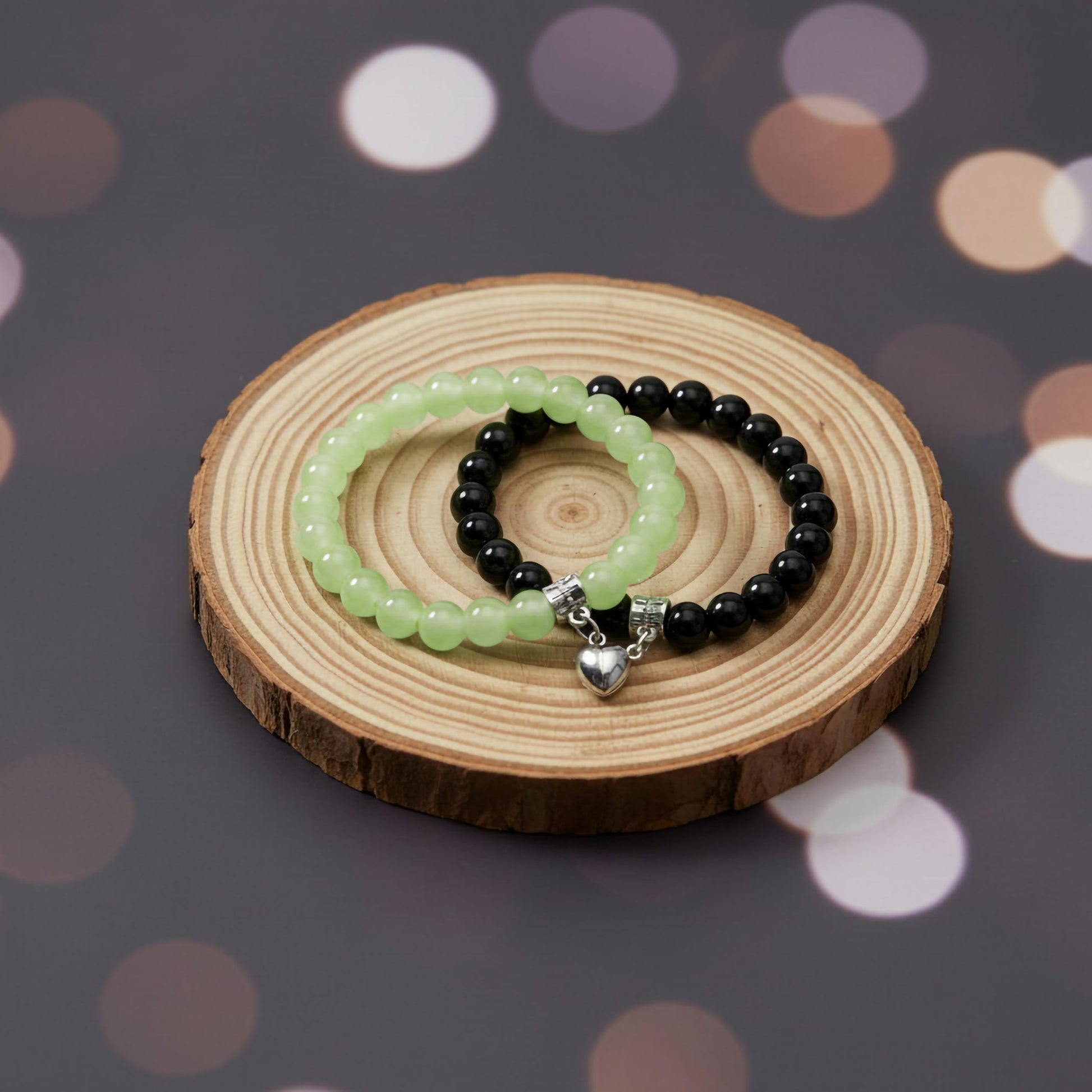 Add meaningful charm detail to outfits with 3-pair bracelet bands made for matching style.