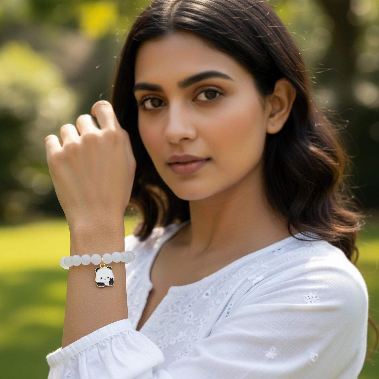 Create easy everyday accessory looks using a white stretch bracelet with glossy beads.