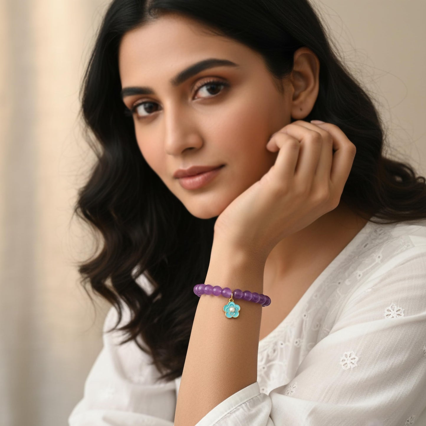 Create easy everyday accessory looks using a purple stretch bracelet with glossy beads.