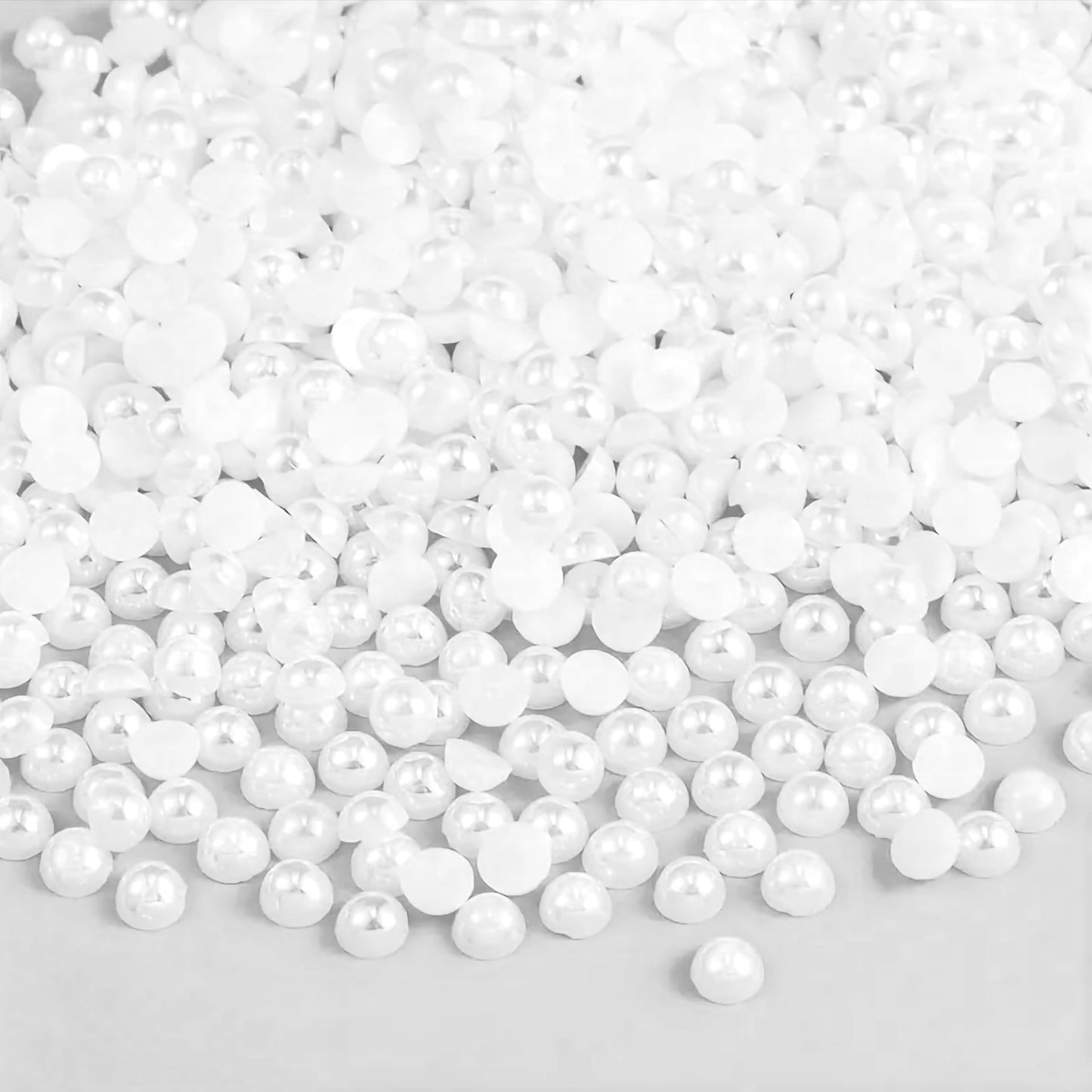 To add a clean decorative look, place 5mm and white 5mm half cut flat back pearls into writing, school use and office notes.