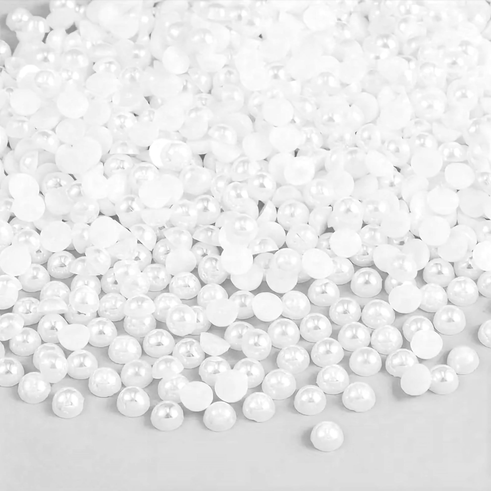 To add a clean decorative look, place 5mm and white 5mm half cut flat back pearls into writing, school use and office notes.