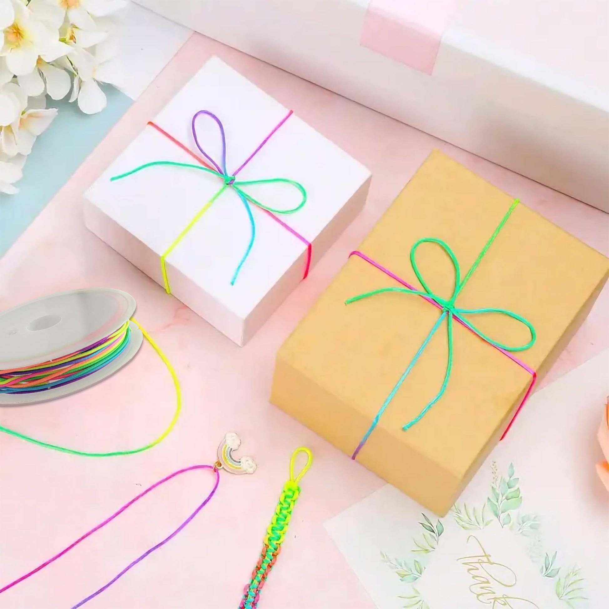 Multicolor Rainbow Elastic String Roll for Bracelet Making and Jewelry. Alternate angle image showing the bracelet shape and finish.