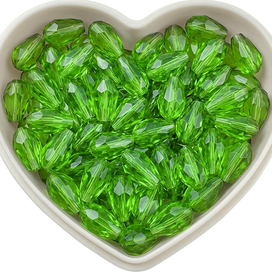 Add graceful dangle accents to earrings and charms with 10x6mm green faceted teardrop beads.