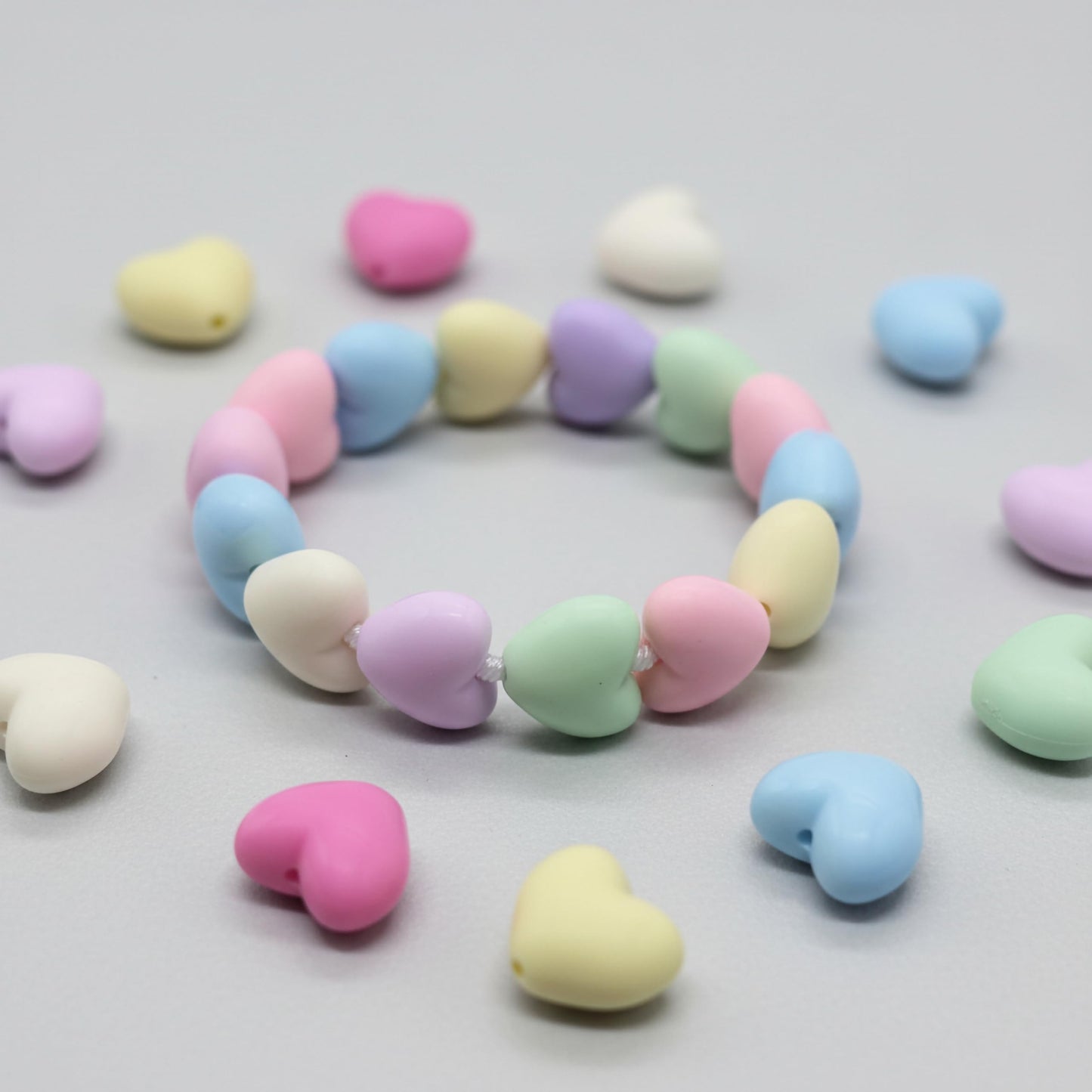 Multicolour frosted heart accents add sweet handmade style to DIY jewelry and cute accessory projects.
