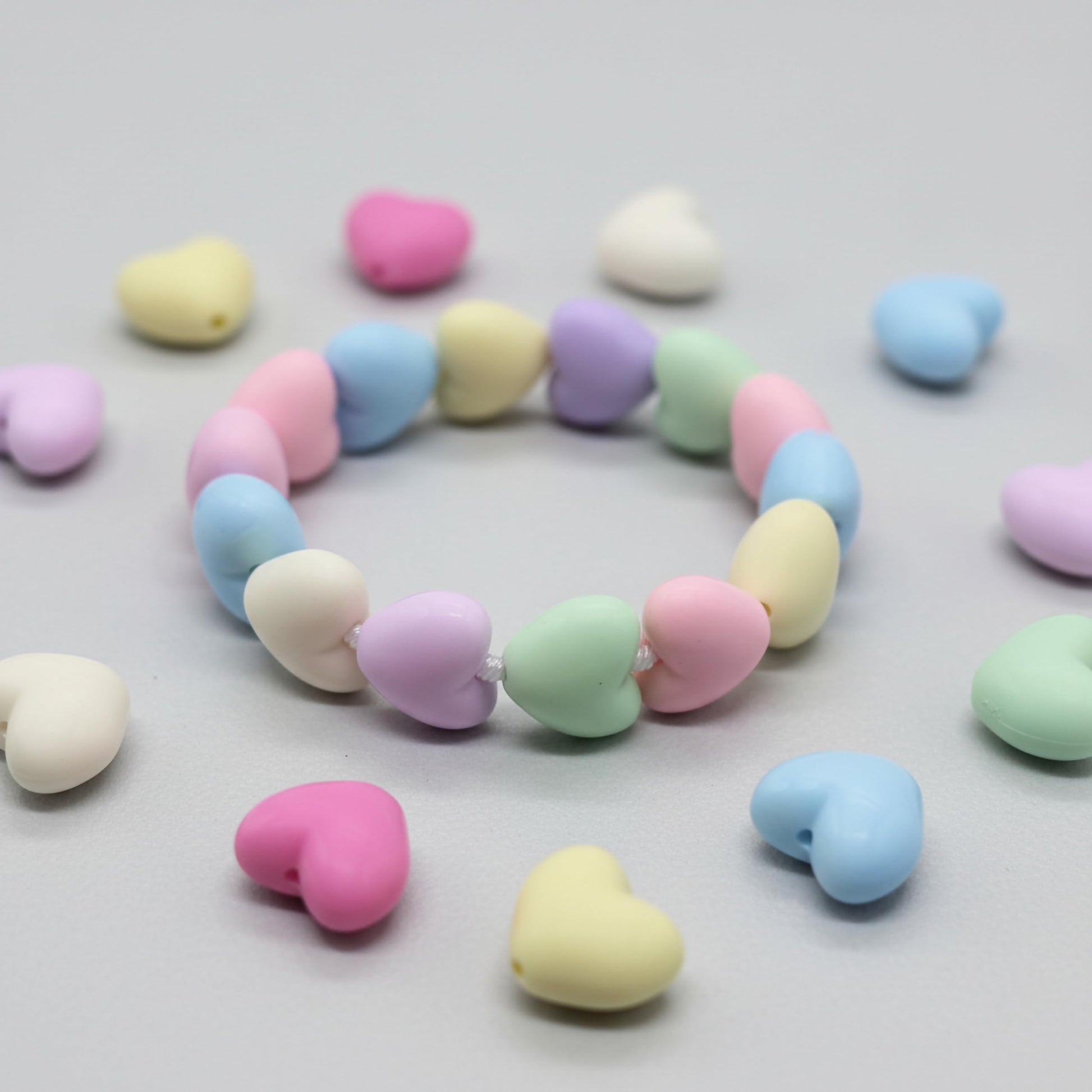 Multicolour frosted heart accents add sweet handmade style to DIY jewelry and cute accessory projects.