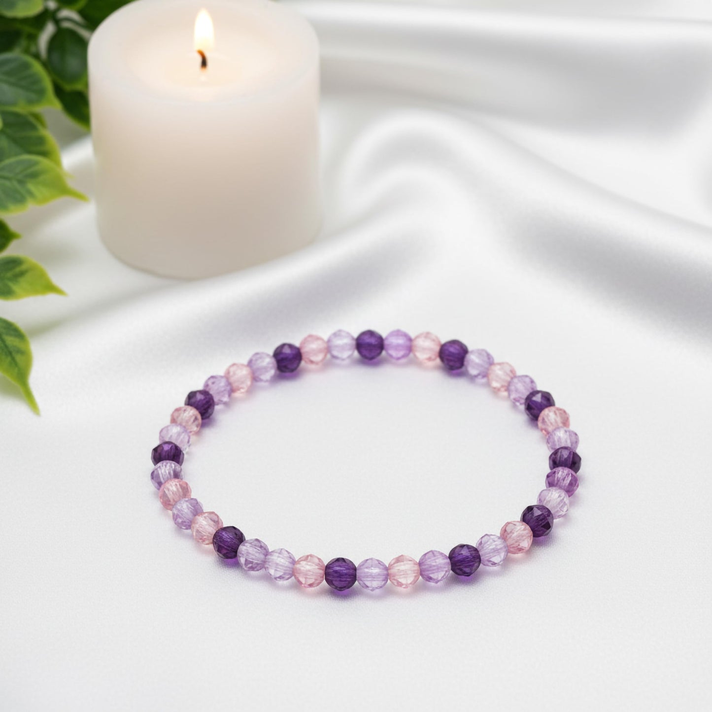 Bring a polished bead finish to casual outfits with a purple faceted bracelet set.