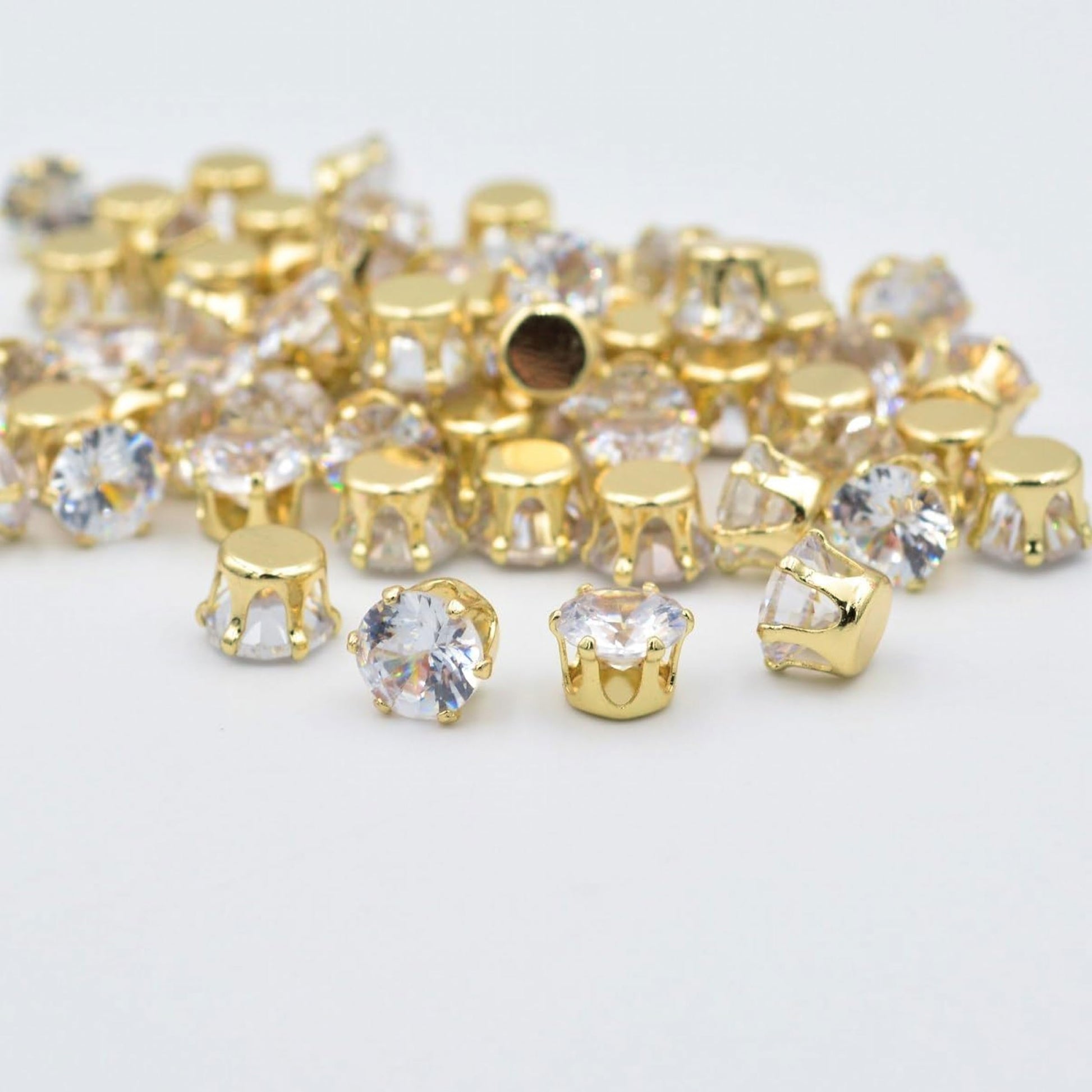 Round 5mm and multicolour 5mm rhinestones and flatback stones offer projects a neat sparkling for sparkling handmade projects and embellishment work.