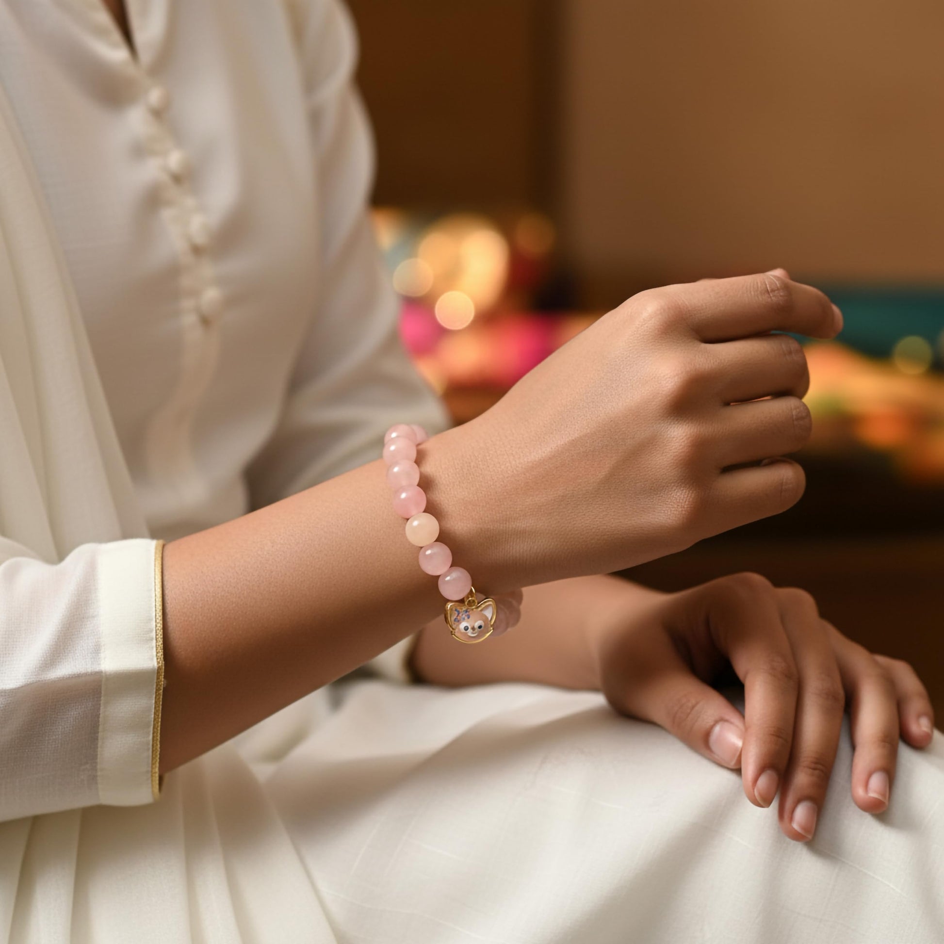 Make everyday styling brighter with a peach beaded bracelet that feels playful and easy.