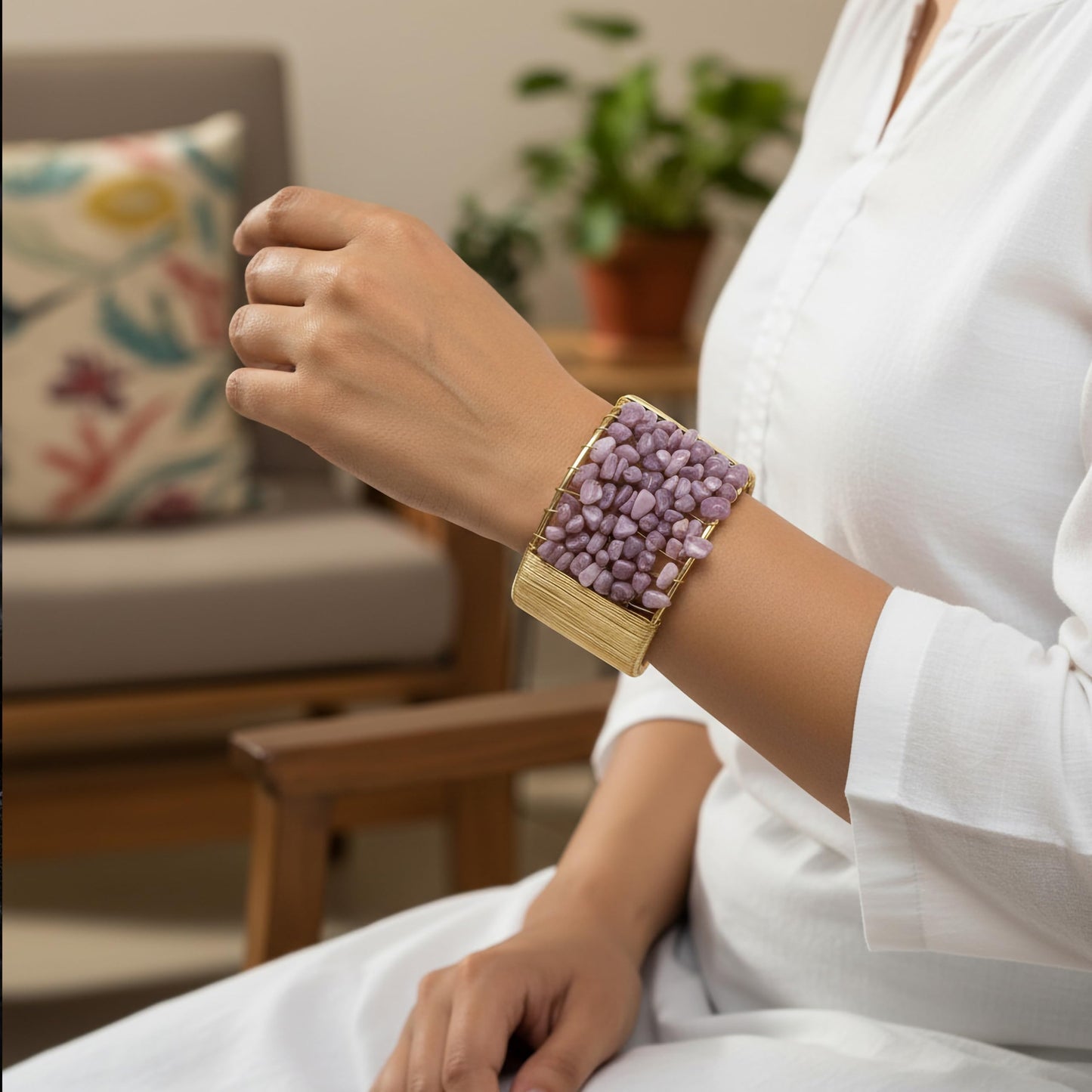 Layer outfits with a textured lavender stone chip bracelet for a strong modern finish.