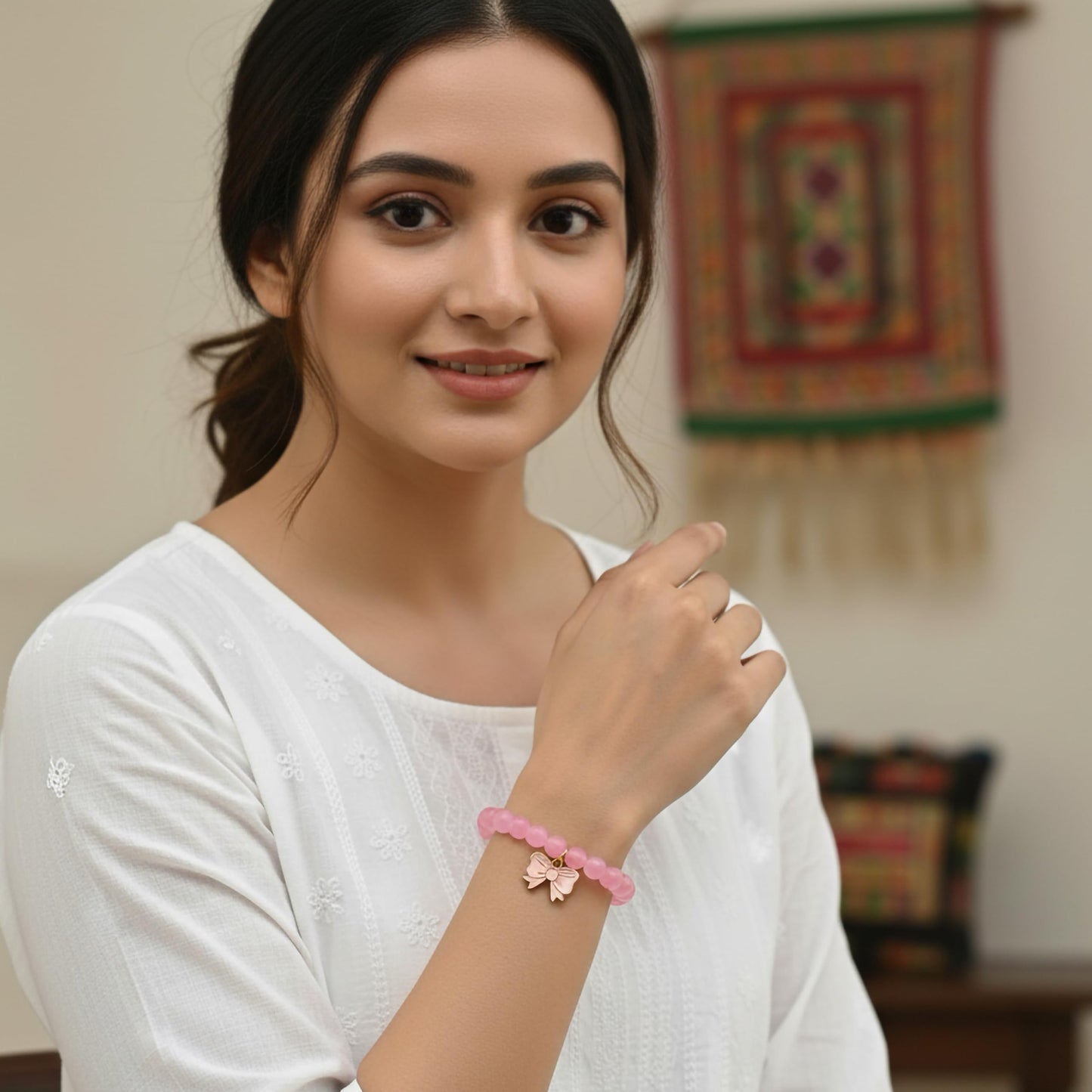 Make daily styling brighter with a pink bead bracelet that feels simple and fun.