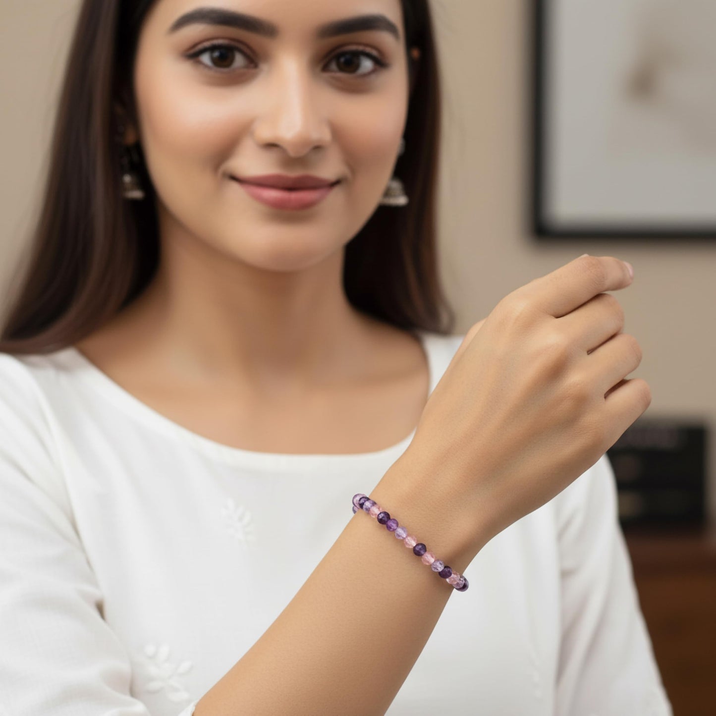 Create a bright friendship accessory look using purple bicone beads and stretch bracelet styling.