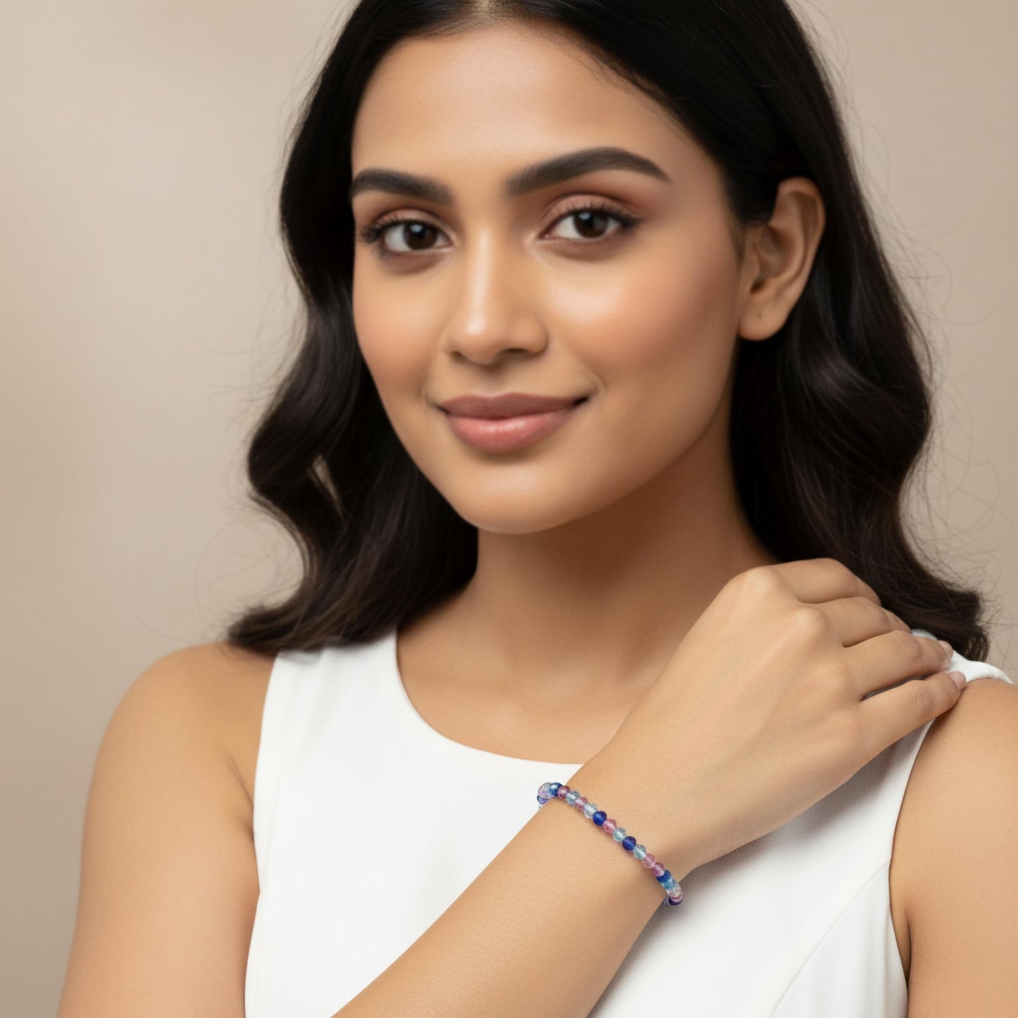 Create a bright friendship accessory look using blue bicone beads and stretch bracelet styling.