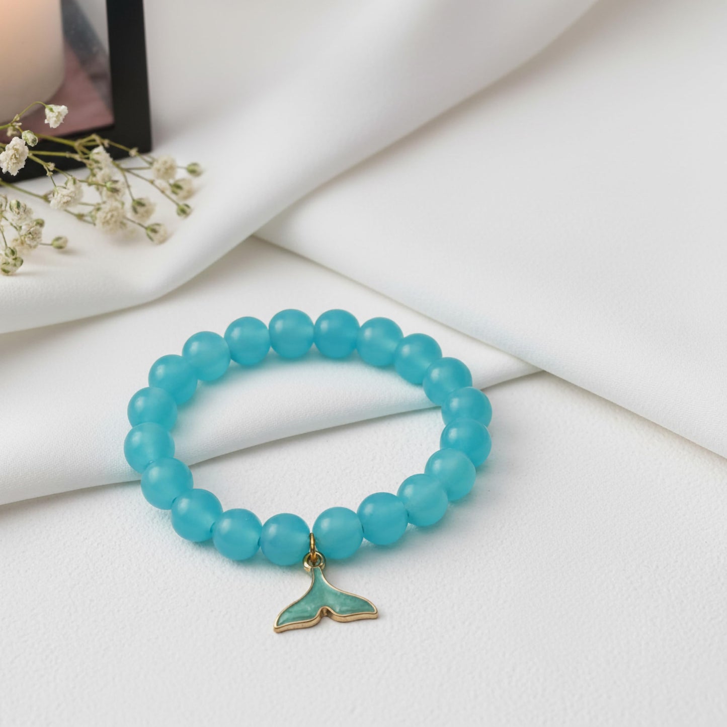Gift a light and cheerful bracelet style with blue beads and comfortable elastic wear.