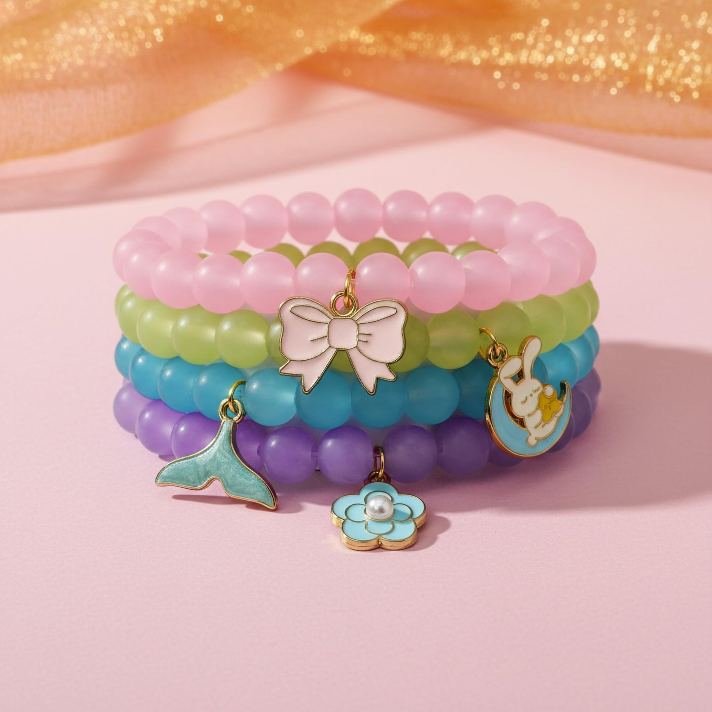Bring cute charm detail to casual outfits with a 4-piece beaded bracelet set for girls and women.