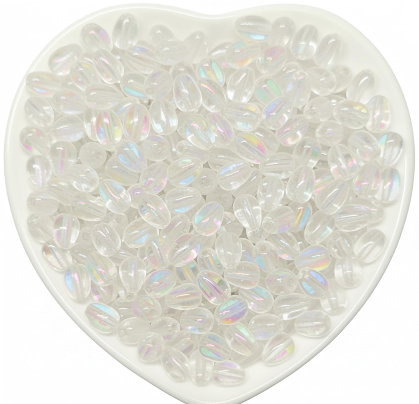 Add eye-catching detail to earring drops and latkan designs using 8x5mm rainbow shine glossy transparent bead drops.