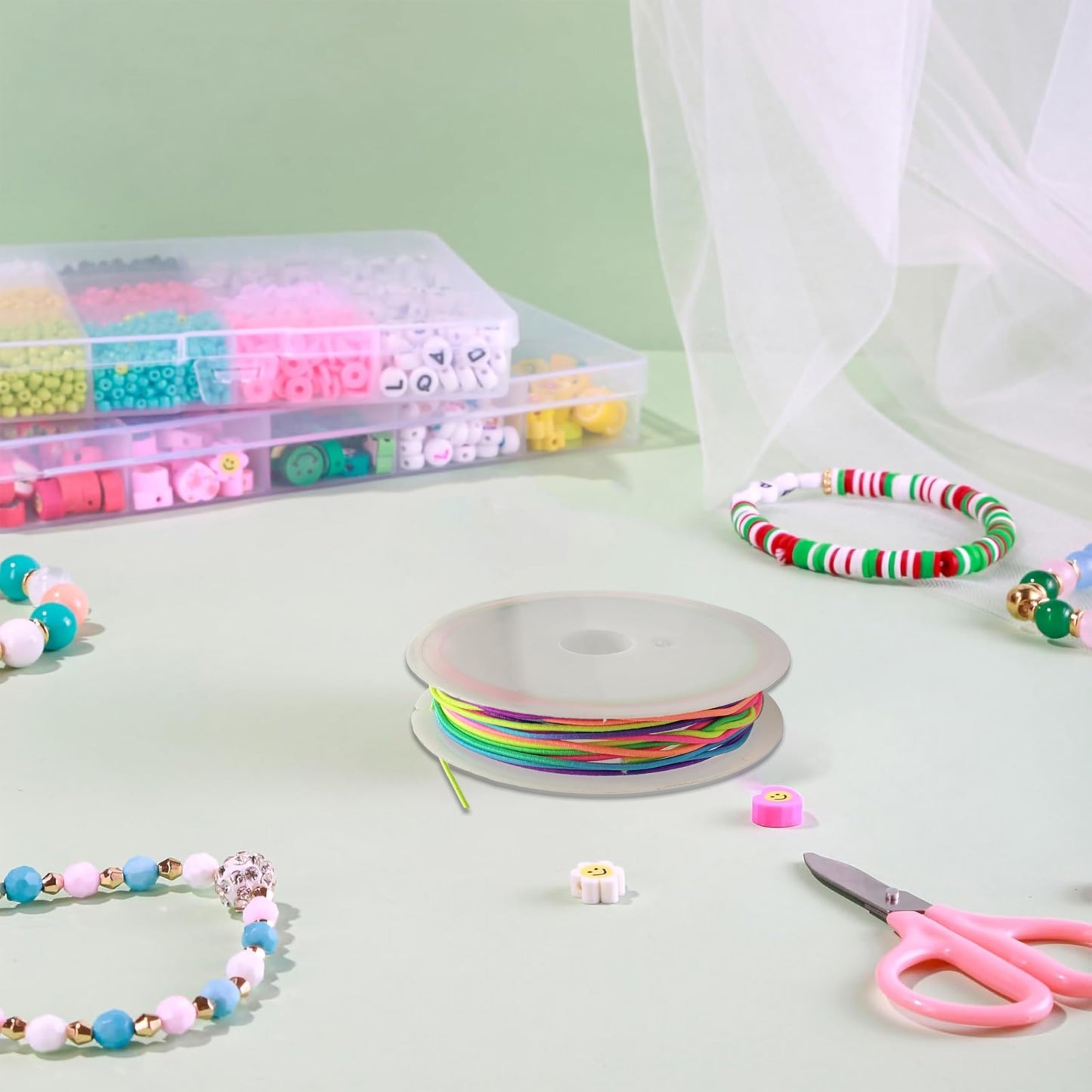 Multicolor Rainbow Elastic String Roll for Bracelet Making and Jewelry. Detailed image showing bracelet styling and craftsmanship.