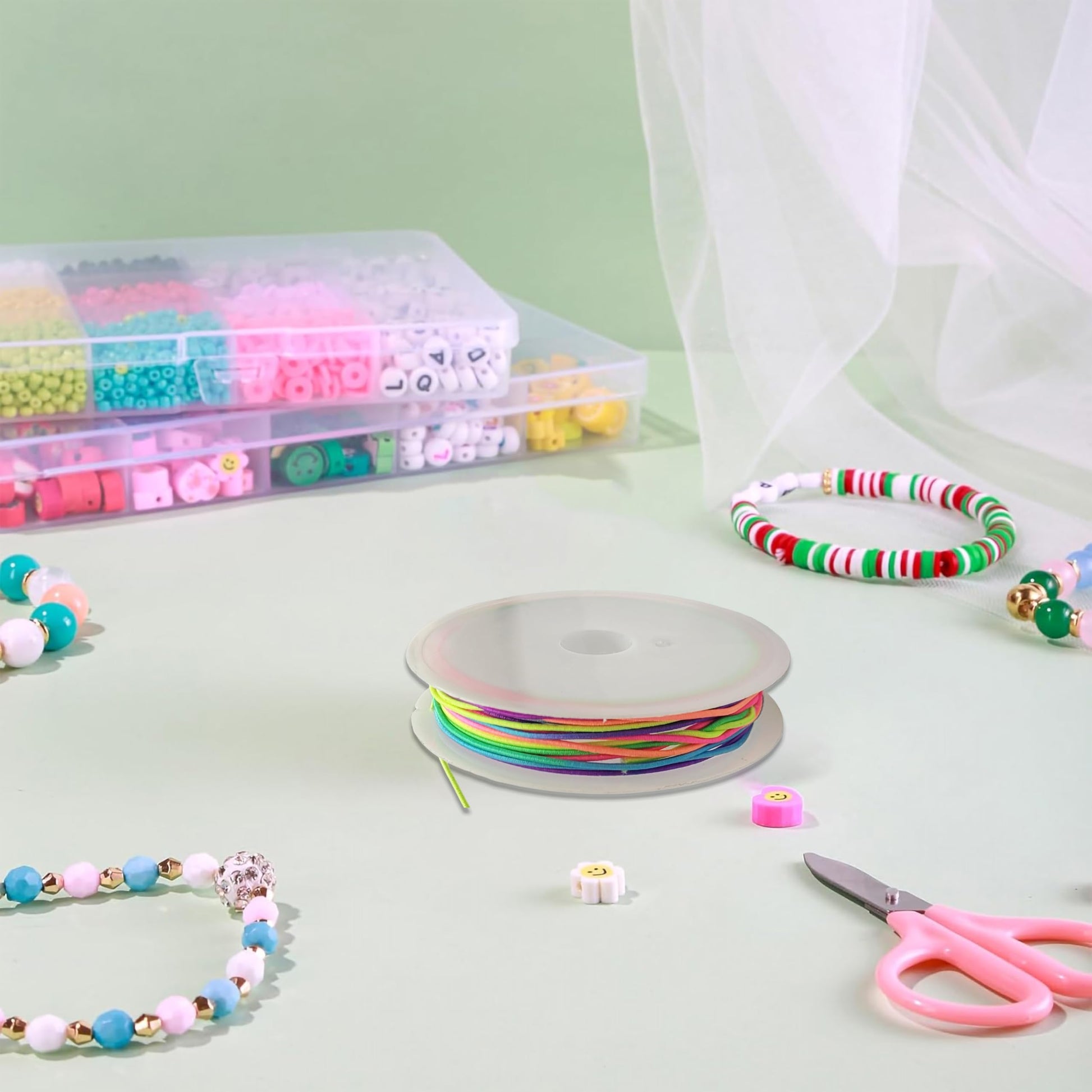 Multicolor Rainbow Elastic String Roll for Bracelet Making and Jewelry. Detailed image showing bracelet styling and craftsmanship.