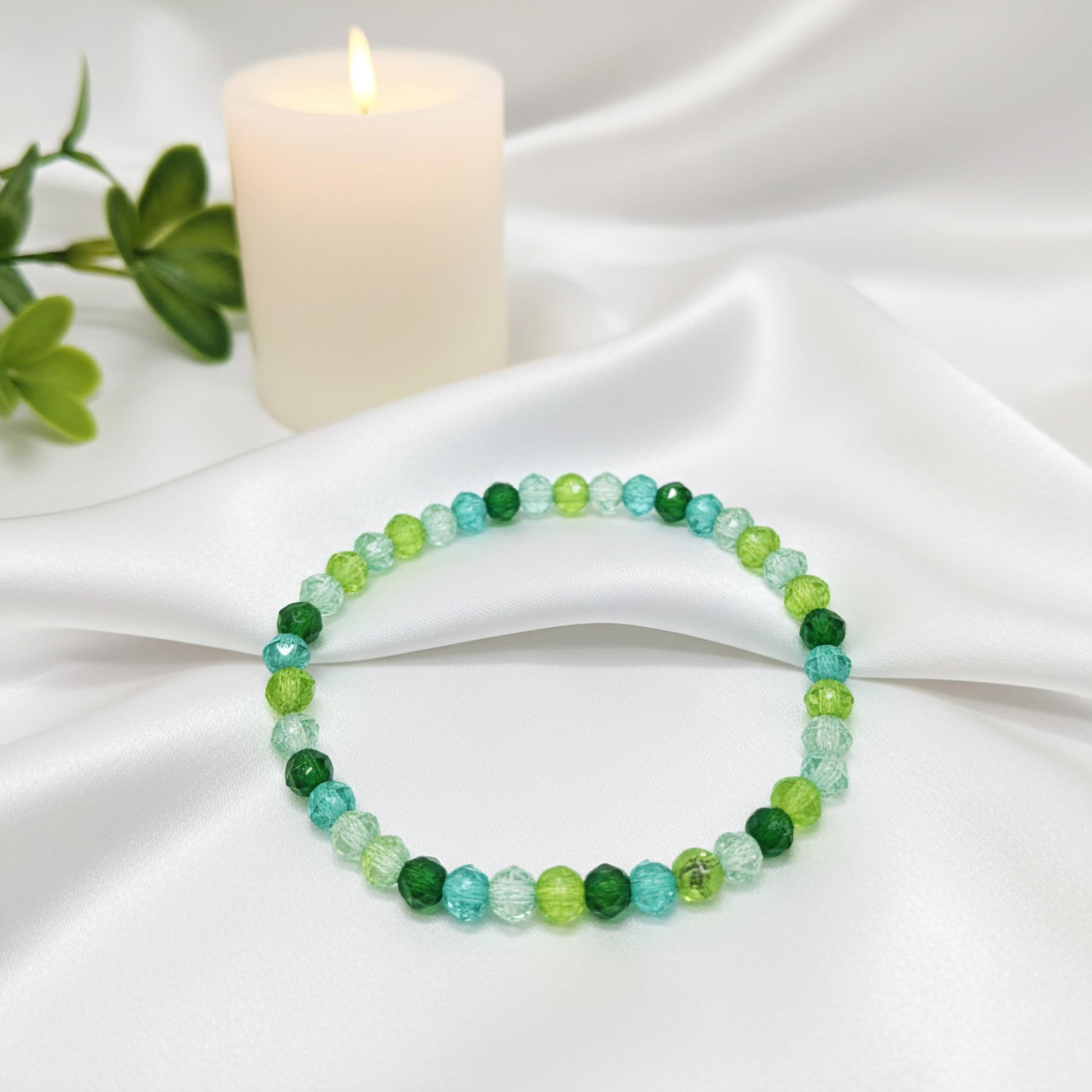 Bring a polished bead finish to casual outfits with a green faceted bracelet set.