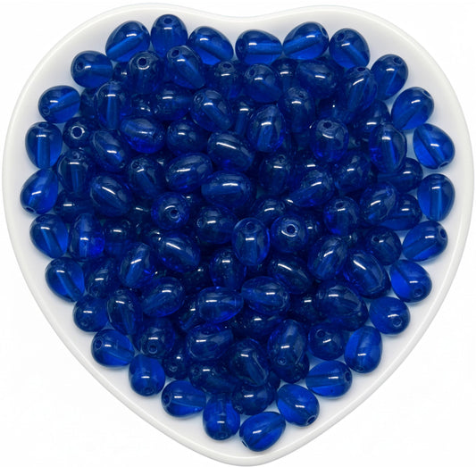 Add glossy teardrop accents to bracelets and earrings with 10x6mm blue glass beads.