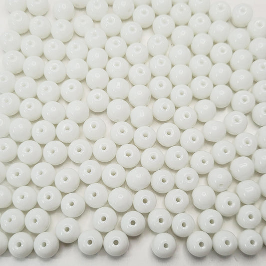 Necklace making benefits from white and transparent 3mm,4mm,6mm,8mm beads and decorative beading finish.