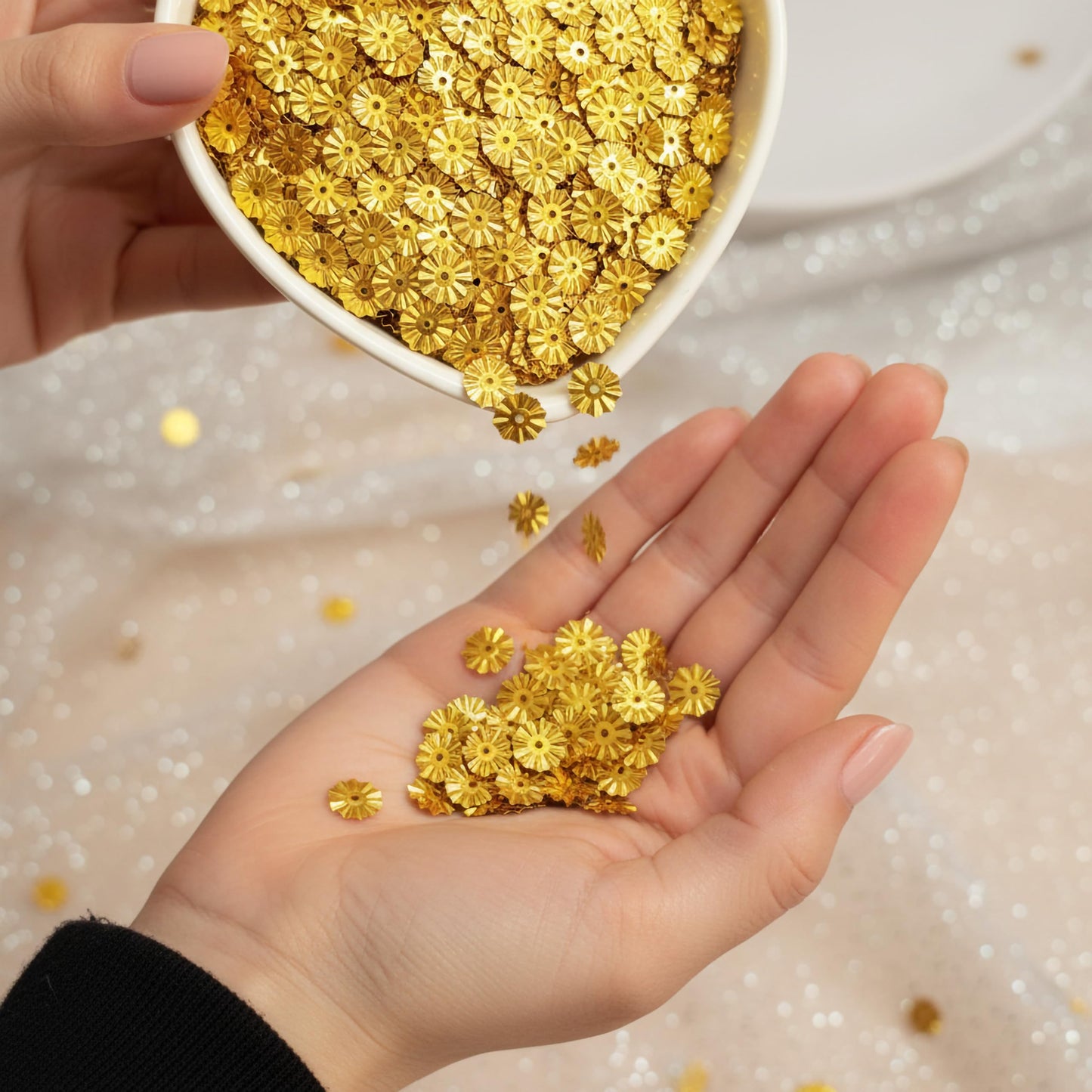 Give boutique craft projects a handmade touch with shiny gold flower chamki pieces for aari embroidery.