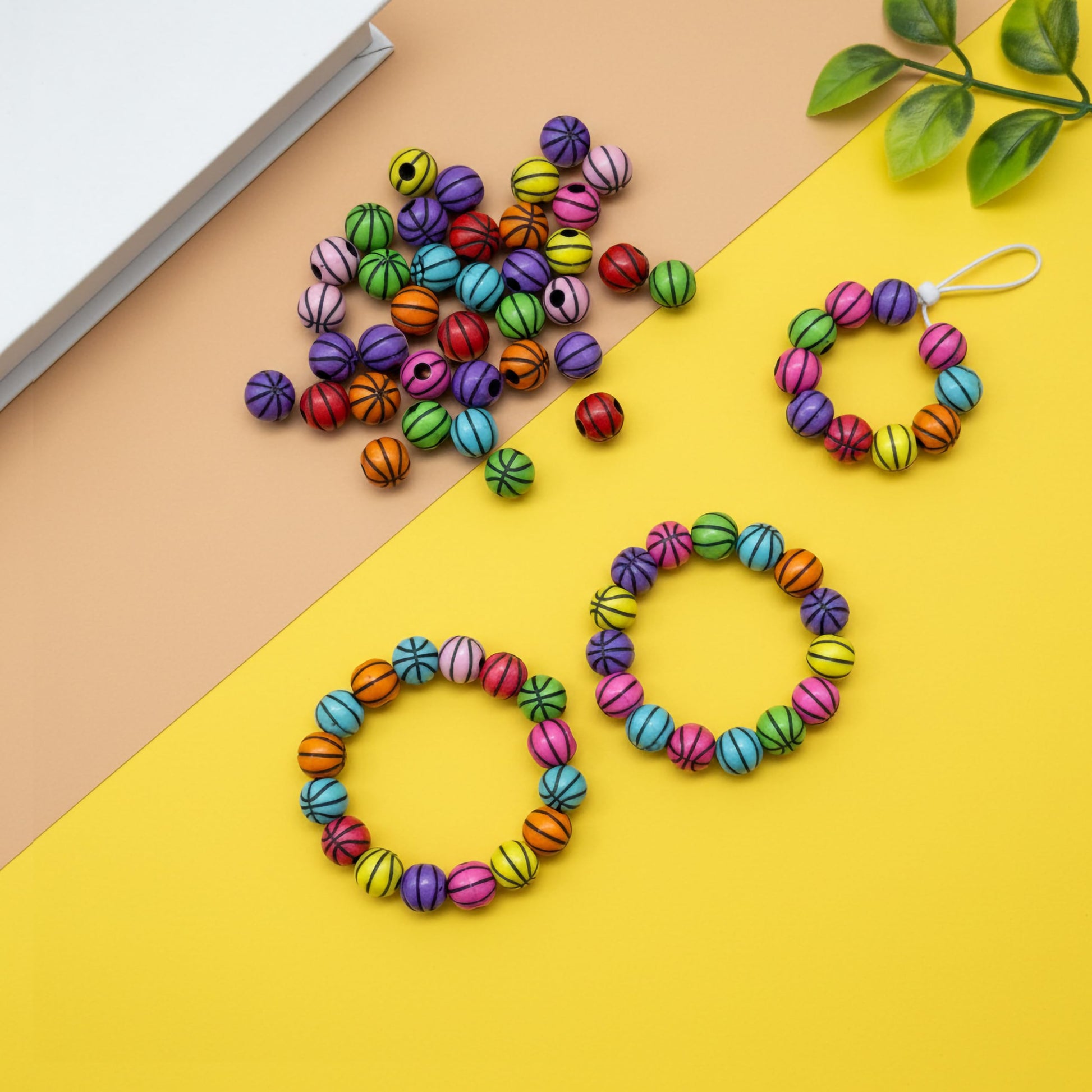 Round acrylic beads with black stripe pattern in bright colors