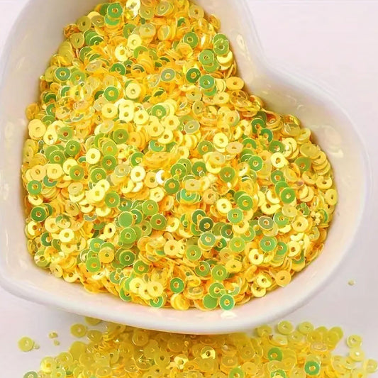 For polished results in Embroidery for embroidery, craft decoration and fabric embellishment, yellow 4mm sequins round shape 4mm sitara sequins with holes help complete the design.