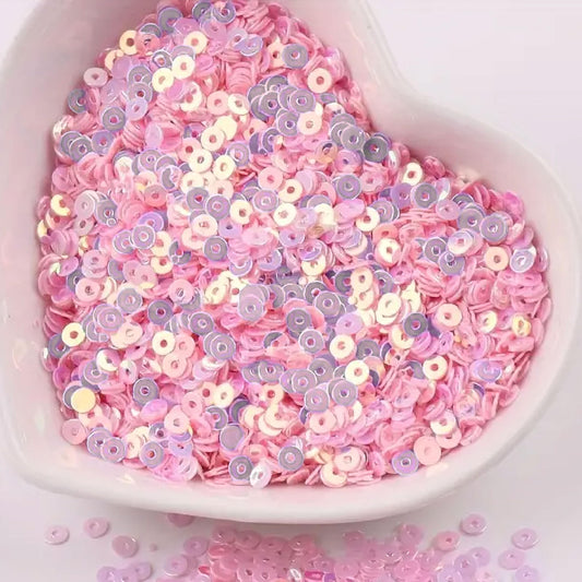 Use light pink 4mm sequins round shape 4mm sitara sequins with holes to give Embroidery for embroidery, craft decoration and fabric embellishment a sparkling look.