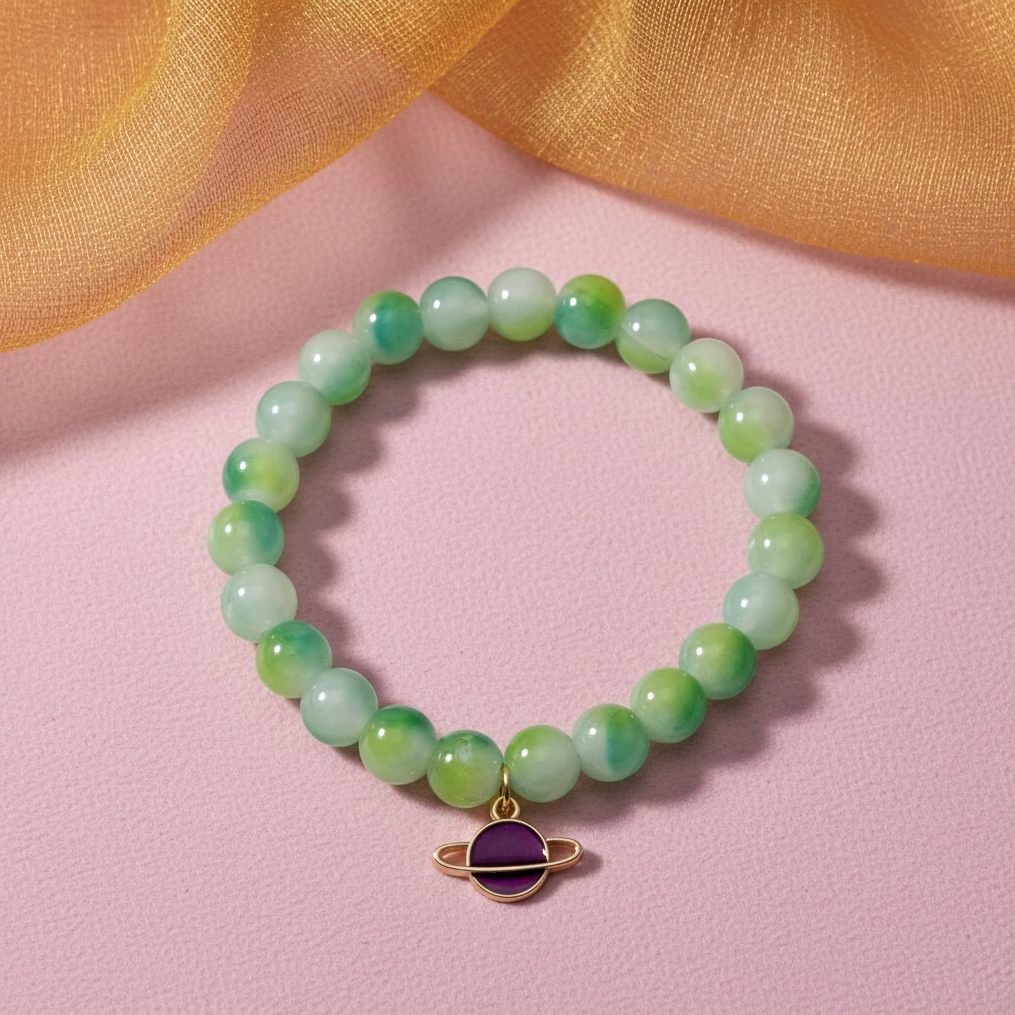 Bring color-block charm to casual outfits with a green stretch bracelet for girls and women.