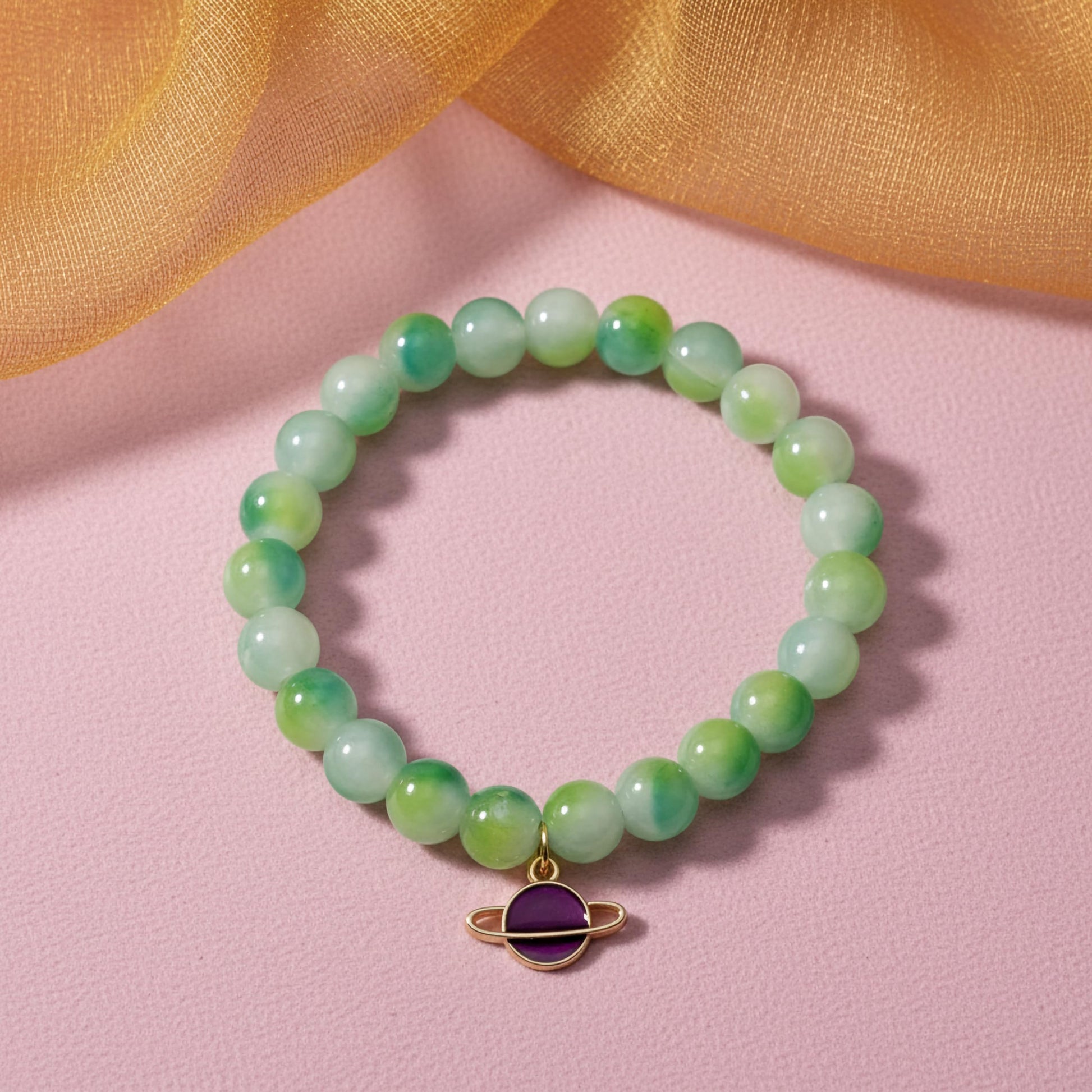 Bring color-block charm to casual outfits with a green stretch bracelet for girls and women.