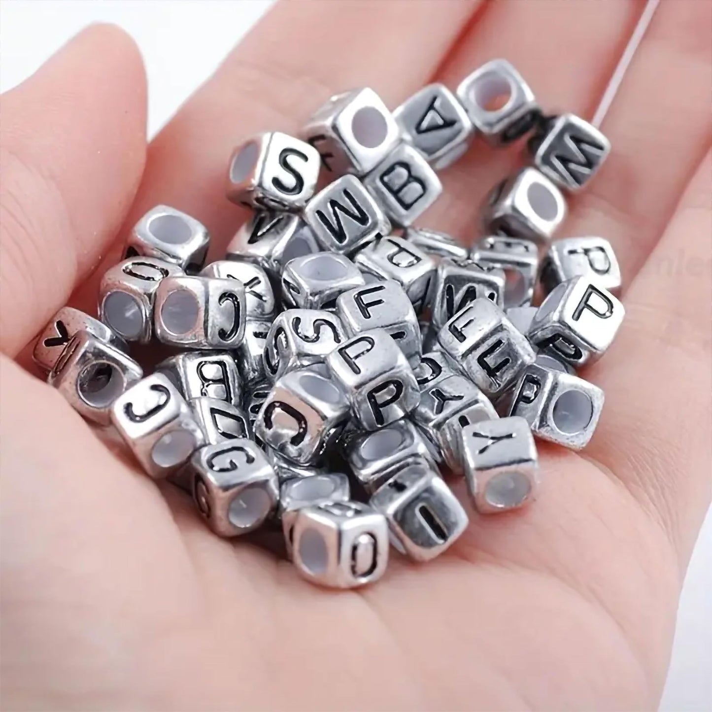 In beading craft, silver black 6 mm and 6mm beads add depth and neat finishing.